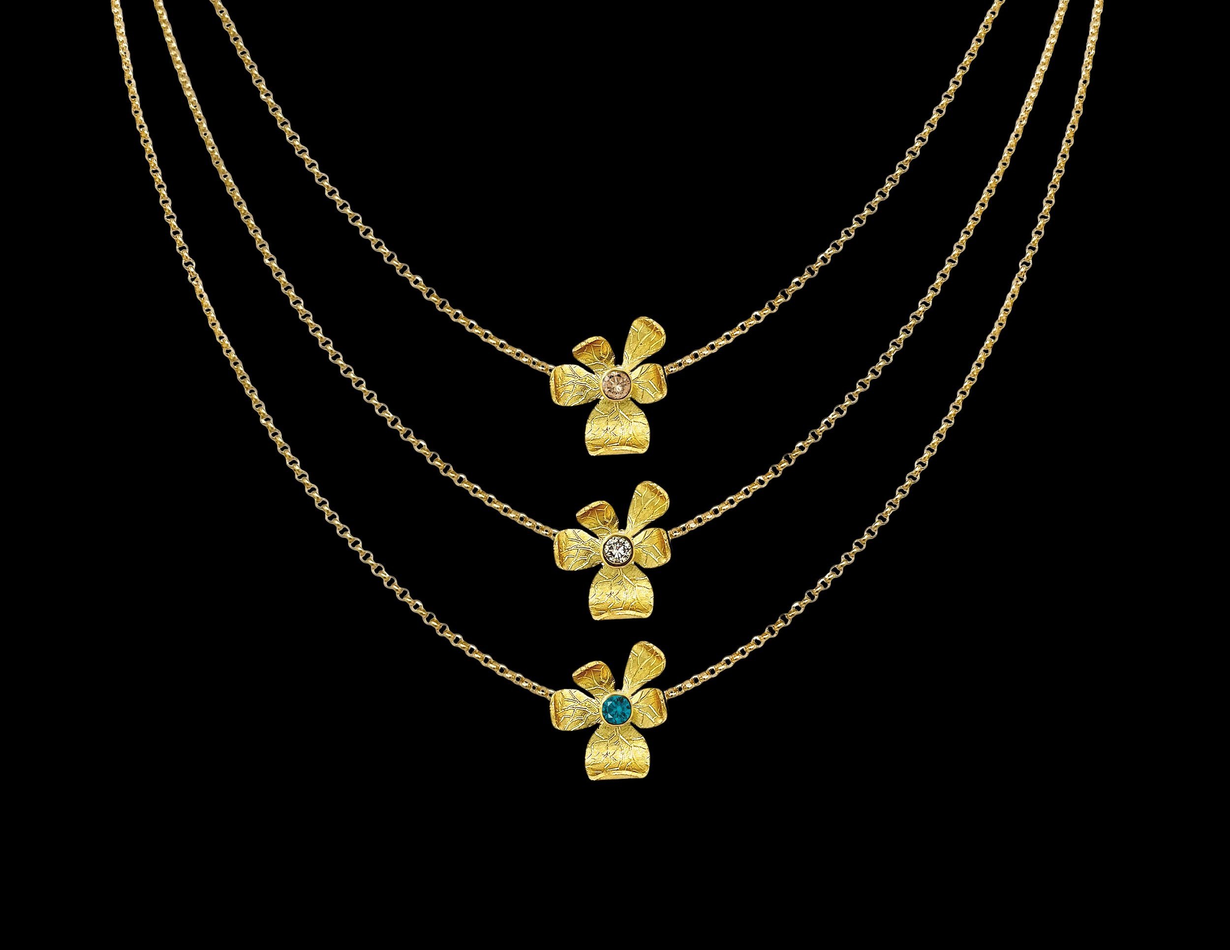 Natura flower pendants in 18K recycled gold with semi precious and precious gemstones 