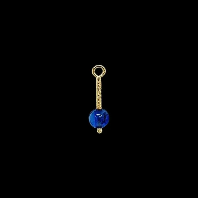 solid 18K yellow gold and blue sapphire charm artisan made