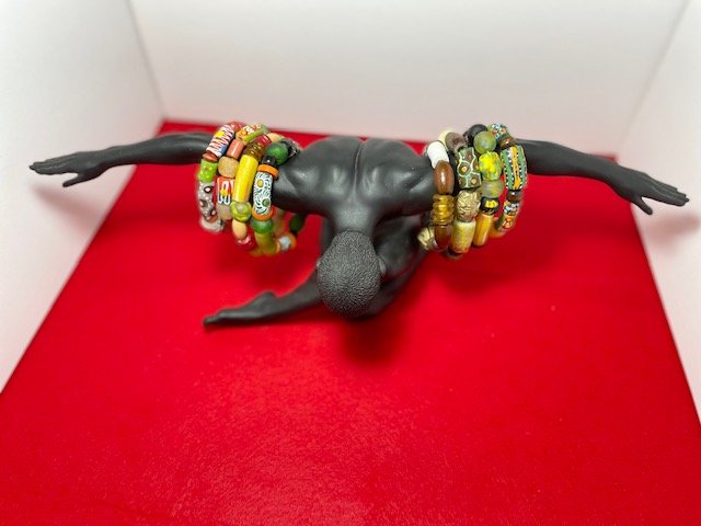 BMan with bracelets.jpg