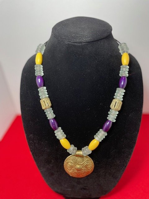 Purple and white necklace with pendant.jpg