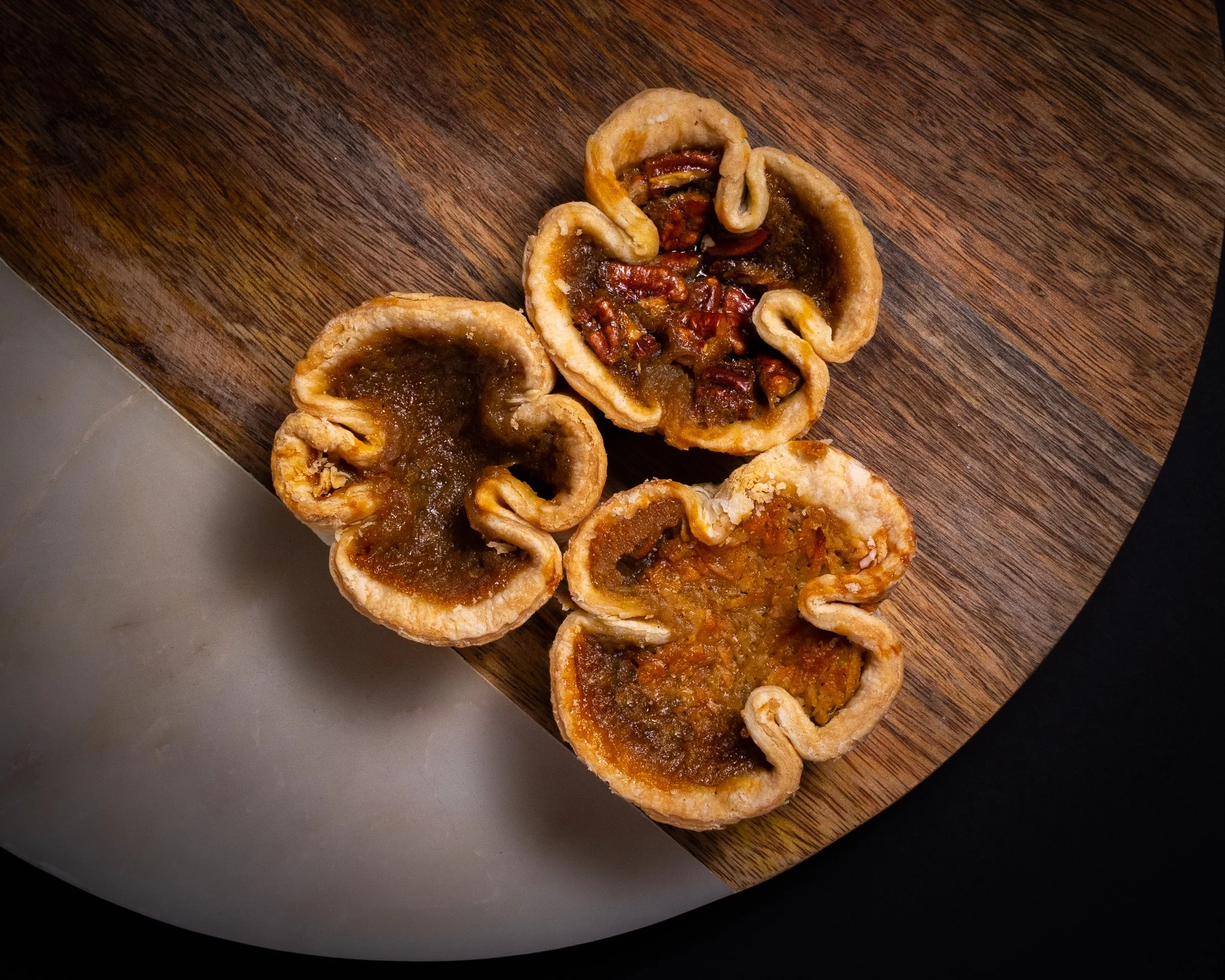 Raisin Butter Tart (left); Pecan Butter Tart (top); Coconut Butter Tart (bottom)