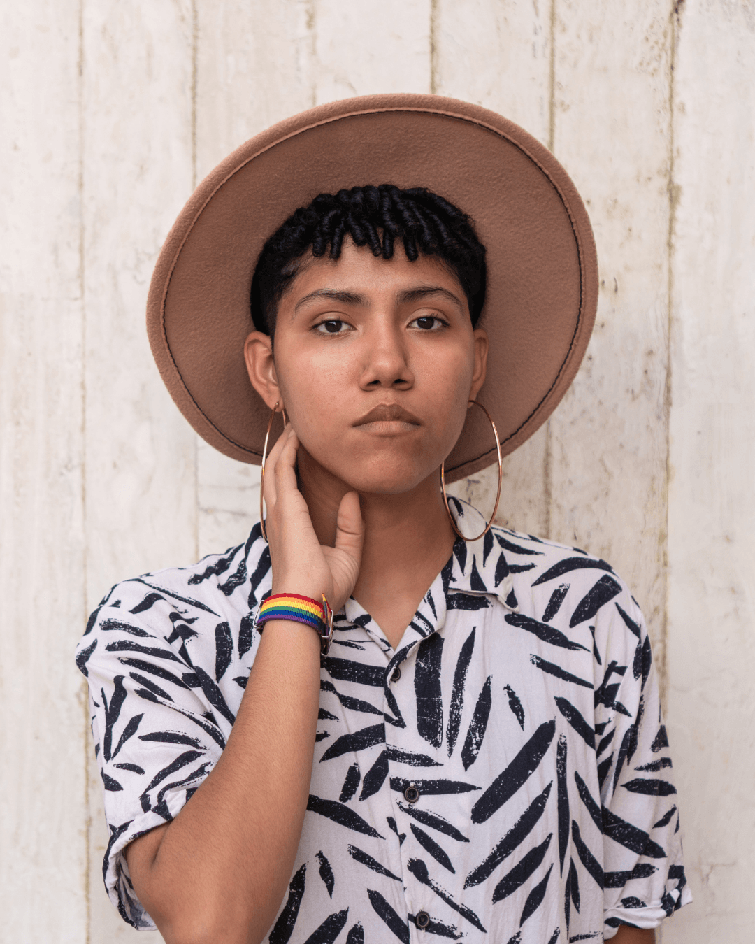 Image of a queer Black person looking at the camera. Struggling with body image is a common, yet difficult experience. A Los Angeles psychologist specializing in body image is available to help. 90027 | 90401 | 90266