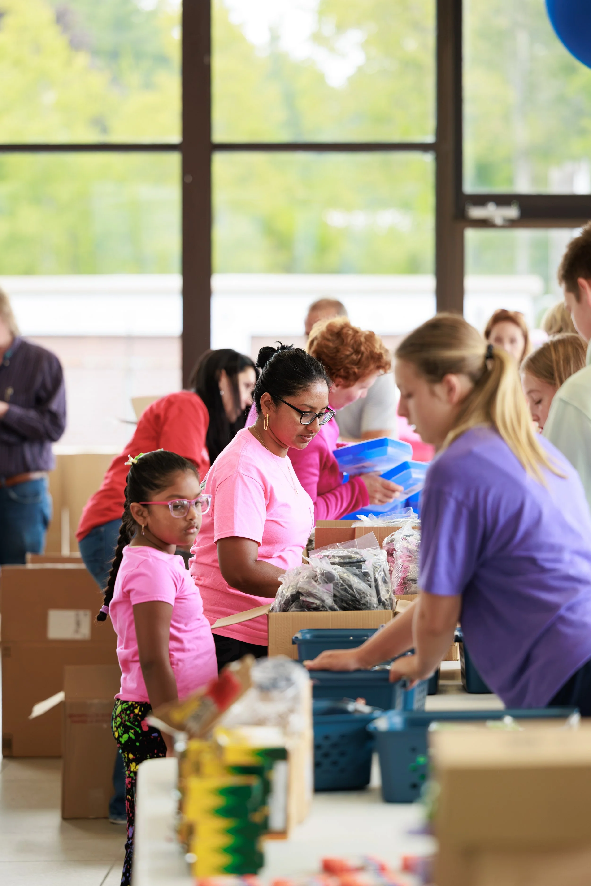 20260818_TriCountyUnitedWay_KidsWithPacksEvent_491A8733_StaciOswaldCreative.jpg