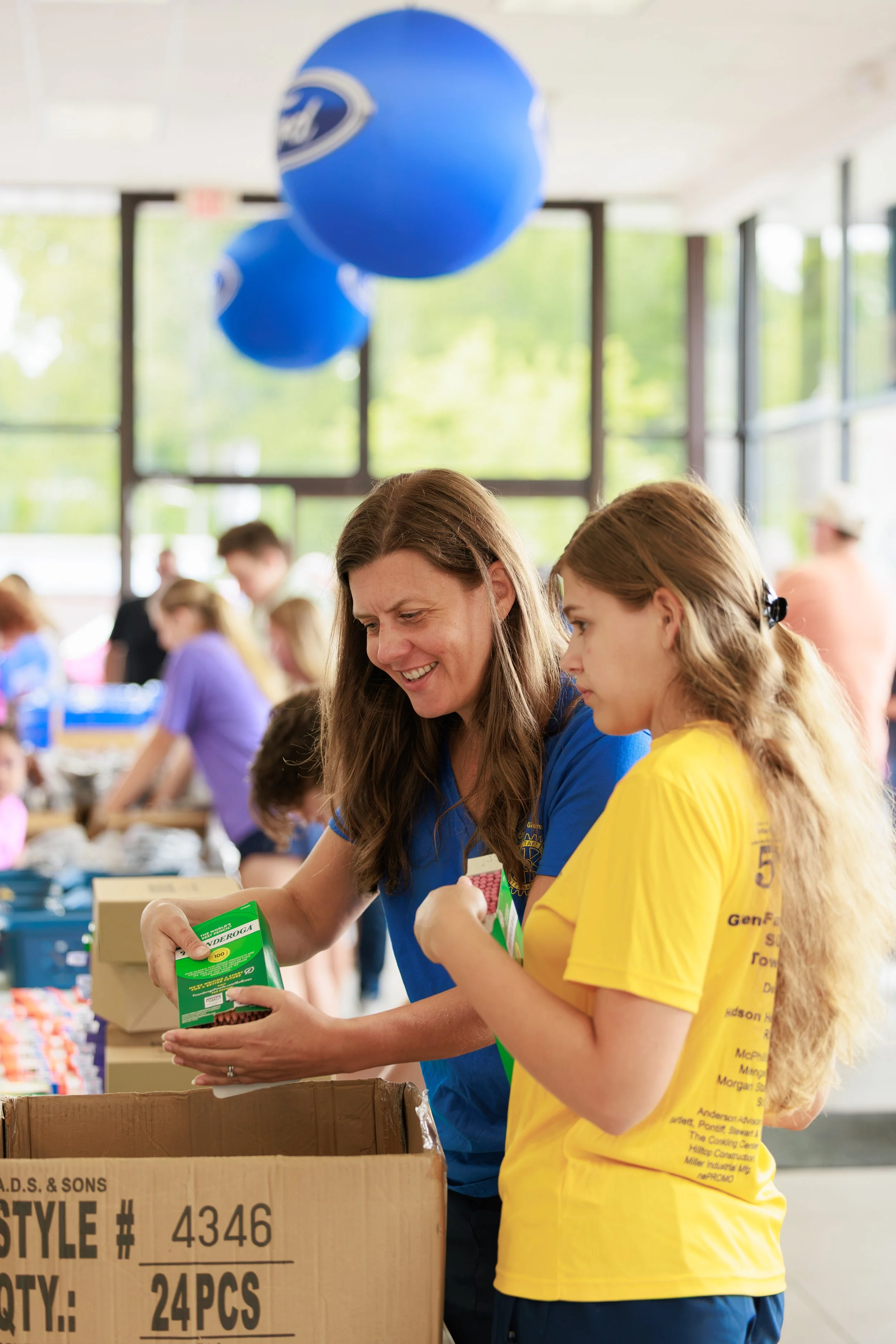 20260818_TriCountyUnitedWay_KidsWithPacksEvent_491A8741_StaciOswaldCreative.jpg