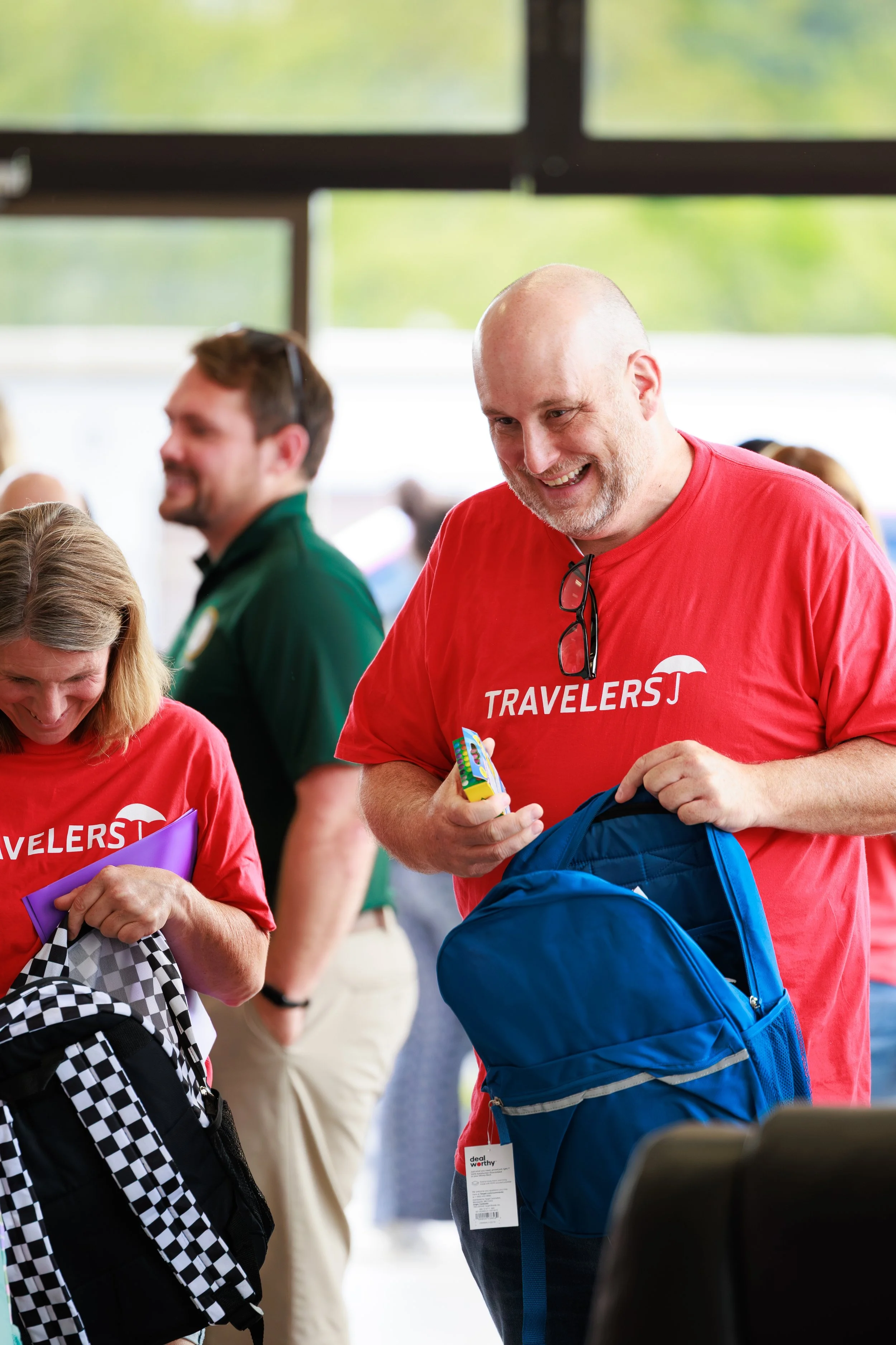 20260818_TriCountyUnitedWay_KidsWithPacksEvent_491A8801_StaciOswaldCreative.jpg