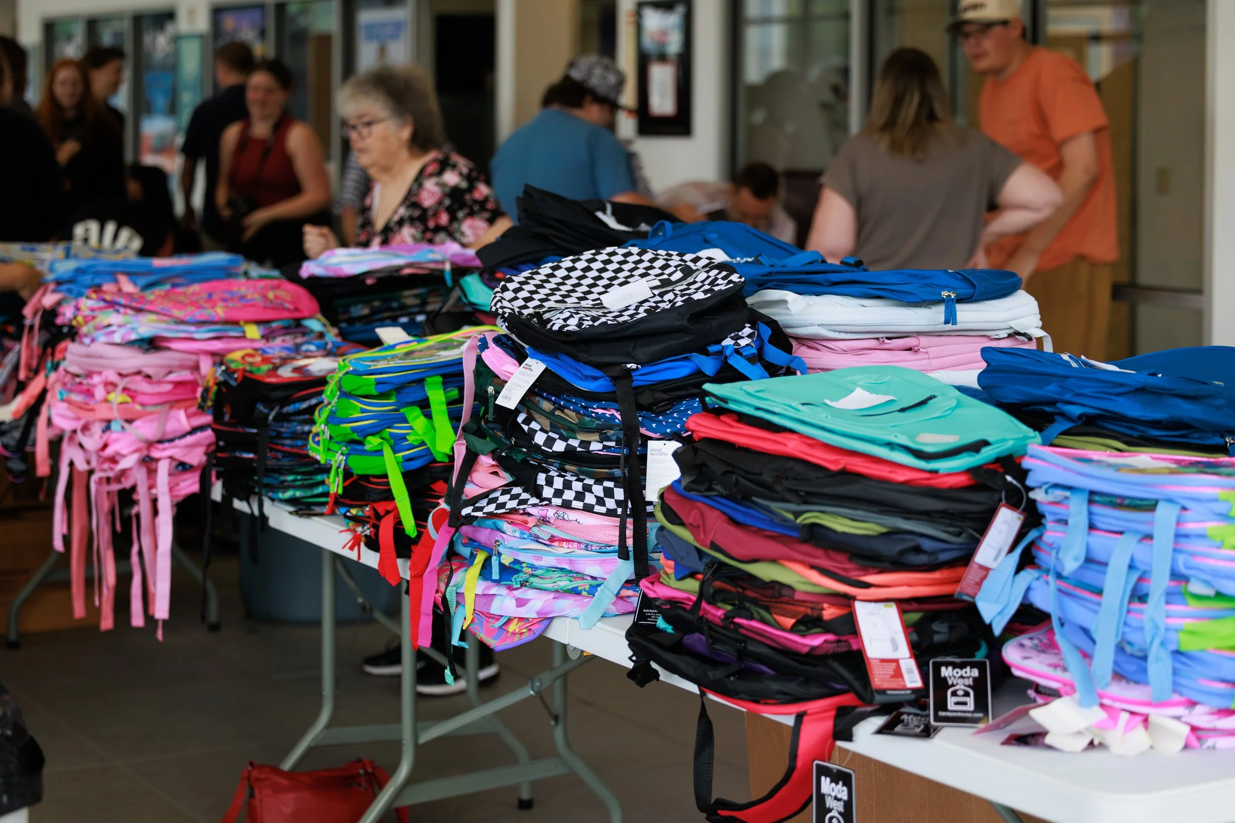 20260818_TriCountyUnitedWay_KidsWithPacksEvent_491A8824_StaciOswaldCreative.jpg