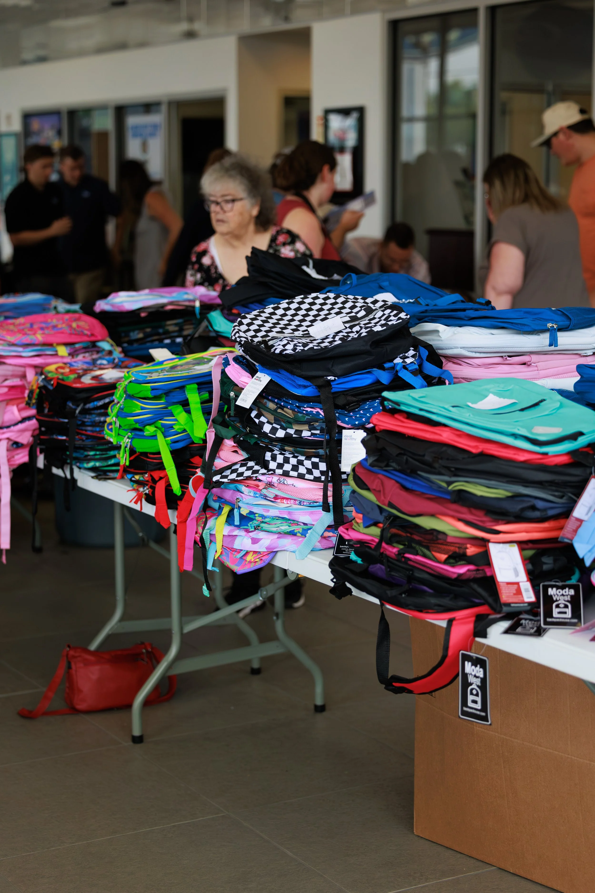 20260818_TriCountyUnitedWay_KidsWithPacksEvent_491A8825_StaciOswaldCreative.jpg