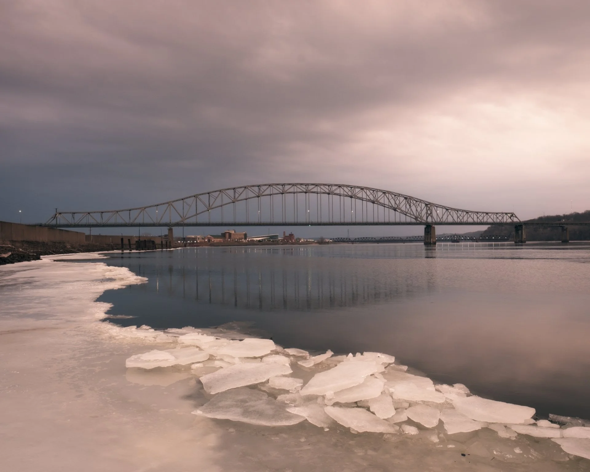 JD bridge with ice foreground storm approaching.jpg