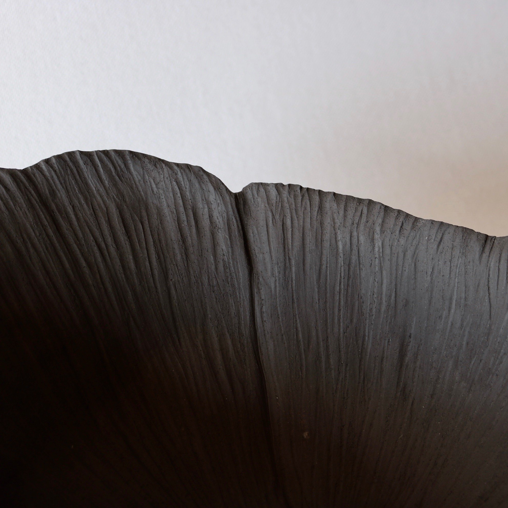 large black ceramic flower bowl 3.jpeg