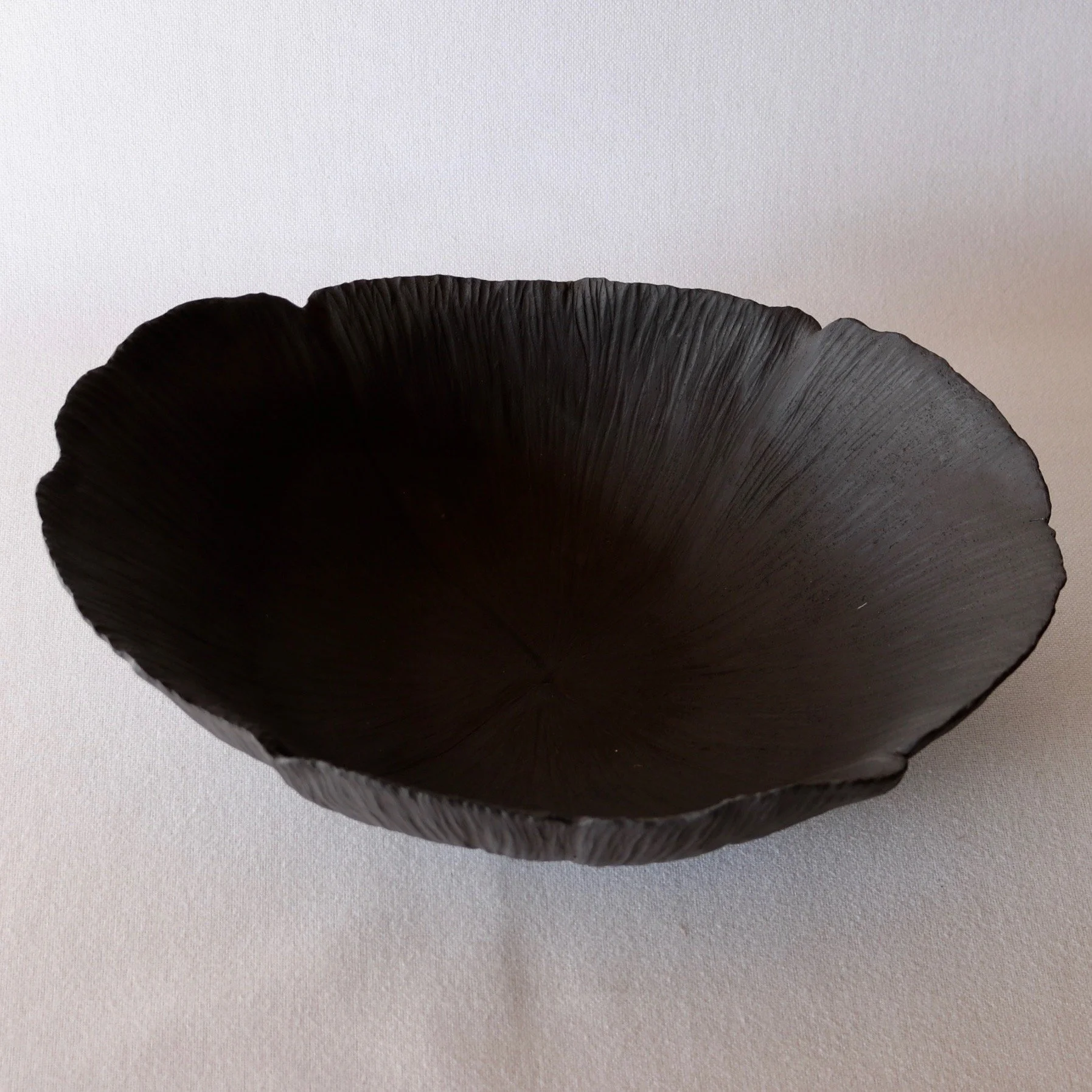 large black ceramic flower bowl 2.jpeg