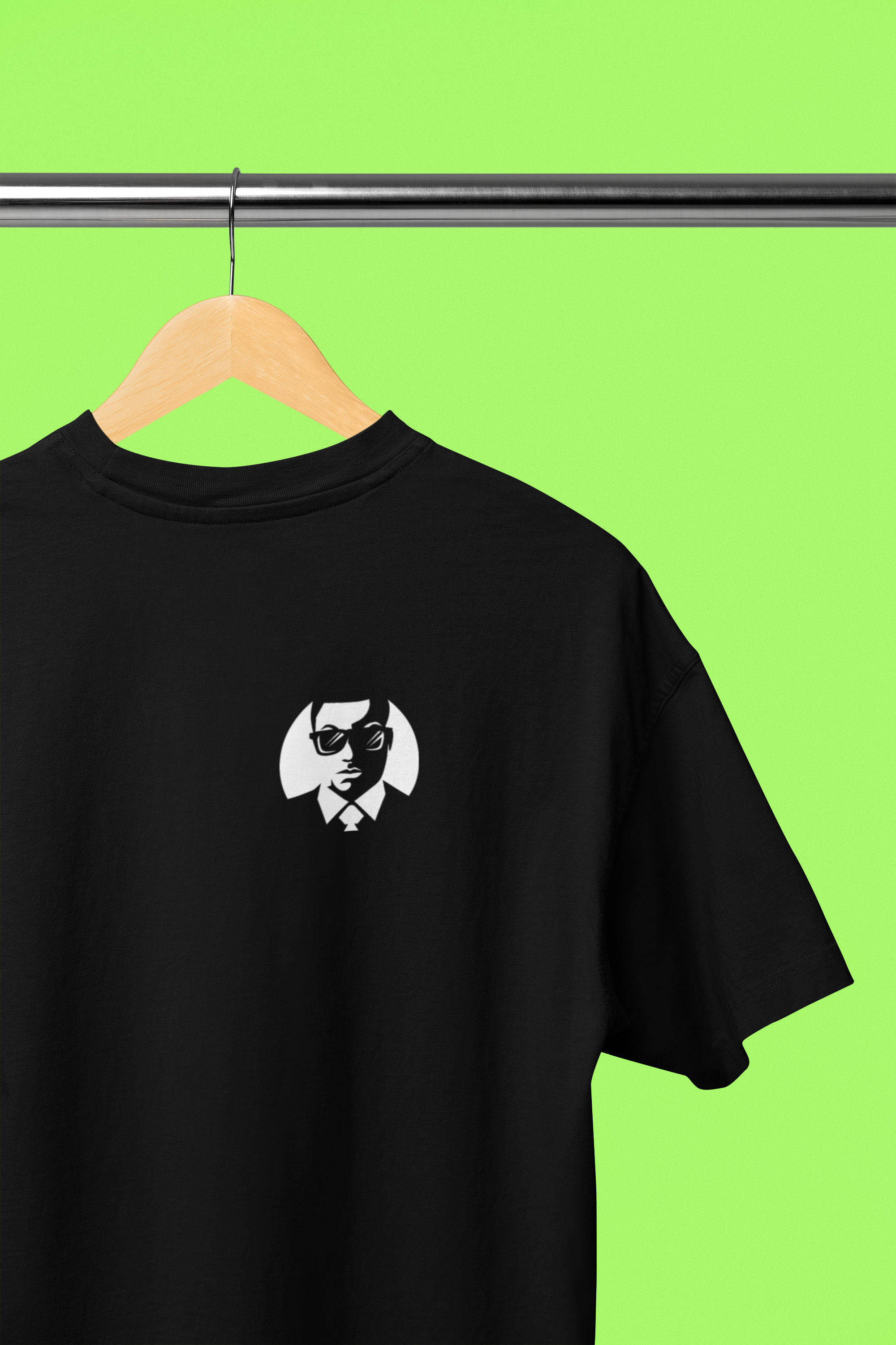 mockup-of-the-back-view-of-an-oversized-t-shirt-placed-on-a-wooden-hanger-m38916.png