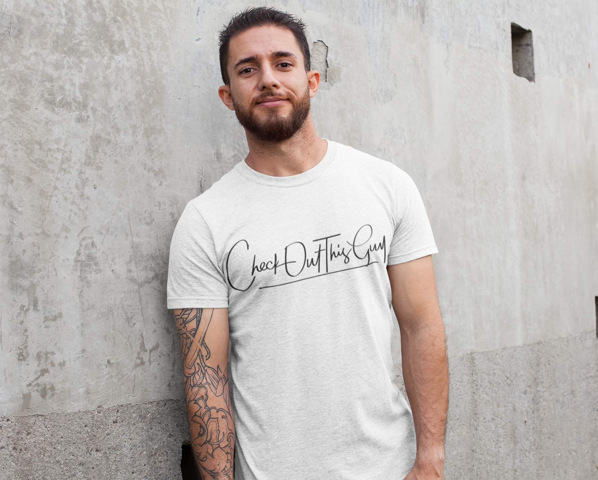 heathered-tee-mockup-of-a-man-leaning-against-a-concrete-wall-28618.png
