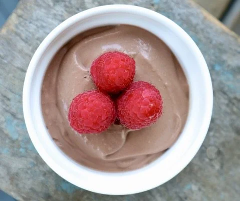 Chocolate Raspberry Mousse in Ramekin with three rawspberries