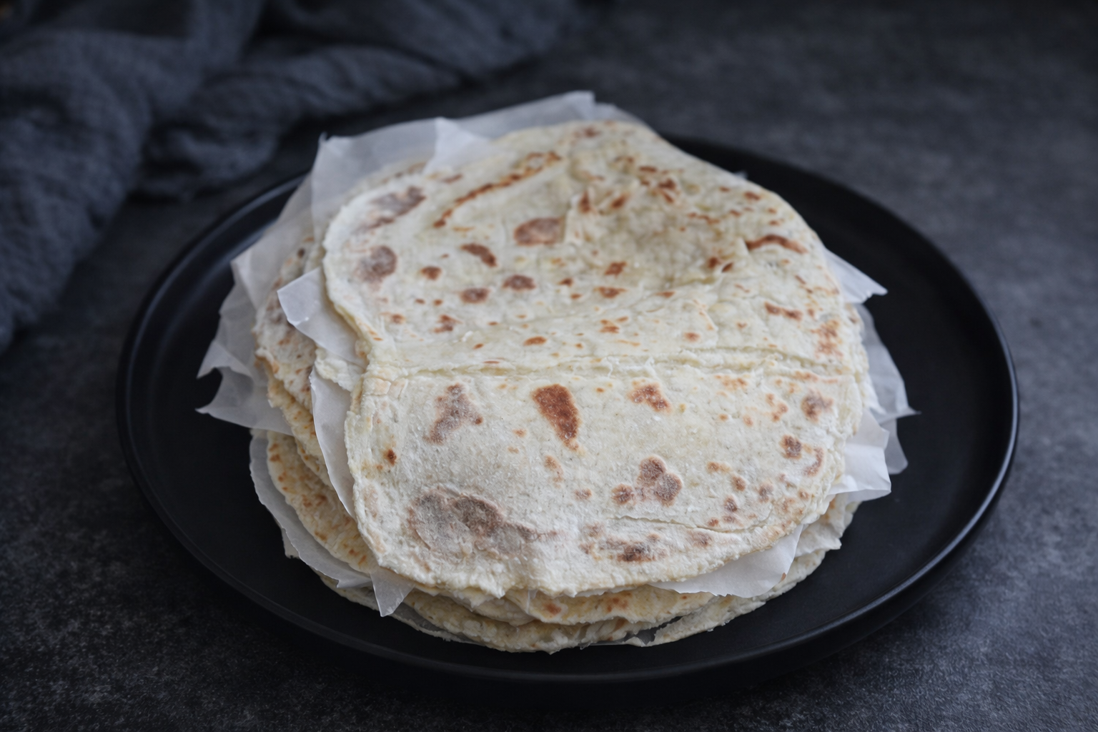 Lefse on a black platter