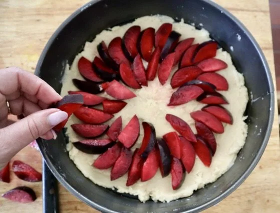 PlumTartAddingPlums.jpg