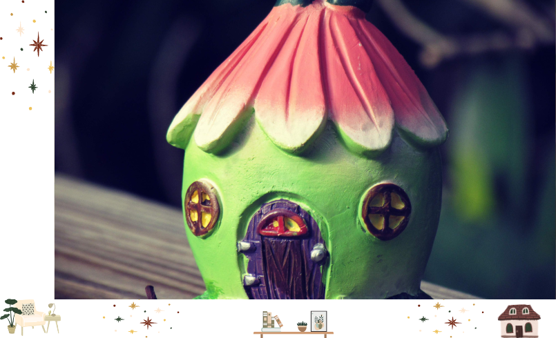 A tiny Green fairy house with a pink tulip roof in the forest