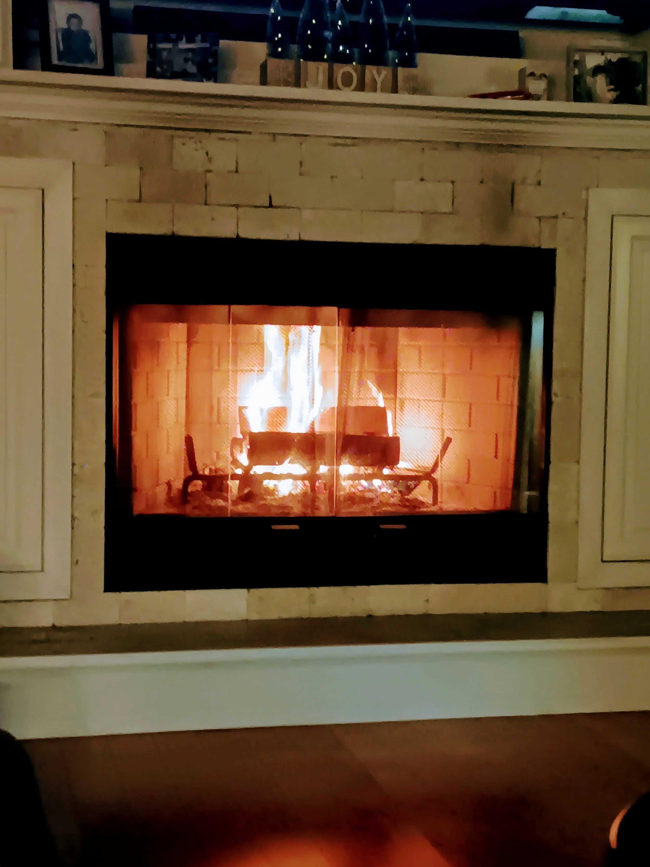 fireplace at Christmastime in the winter months