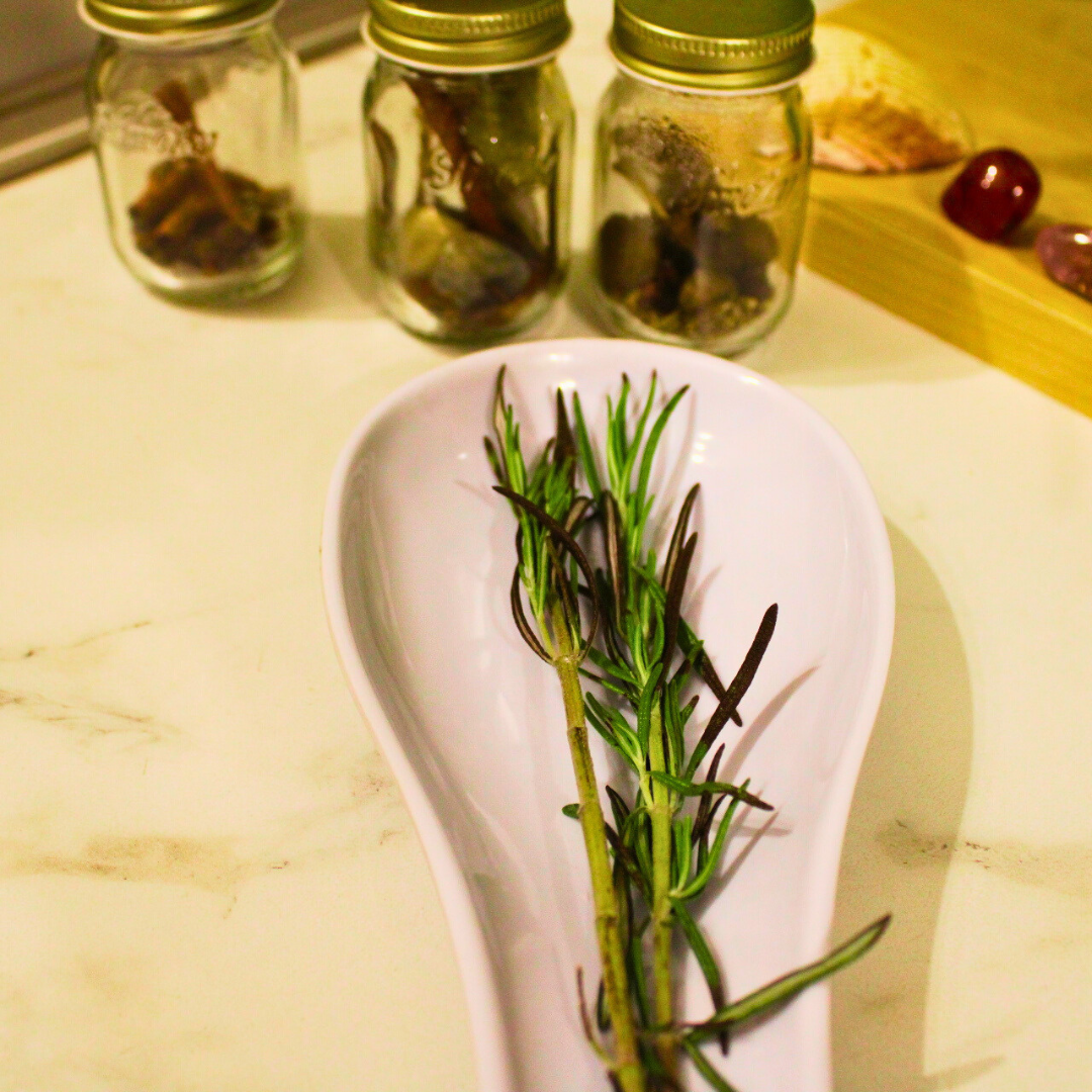 fresh rosemary in a kitchen spoon holder