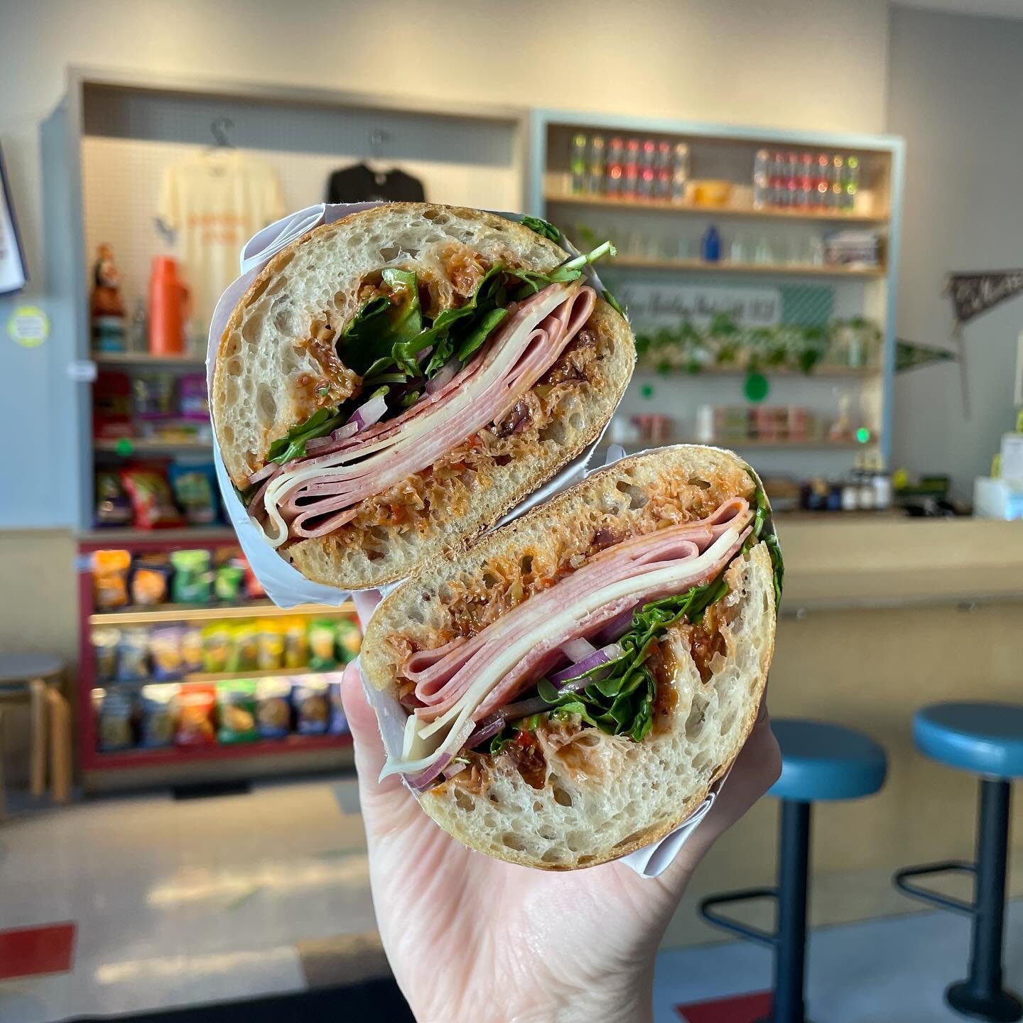 Calling all olive fans to the front: it&rsquo;s Choppenade season! Our version of a muffuletta has a housemade olive and red pepper tapenade, mortadella, genoa salami, provolone, arugula, and red onion. We also have a vegetarian version, Cheesy Choop