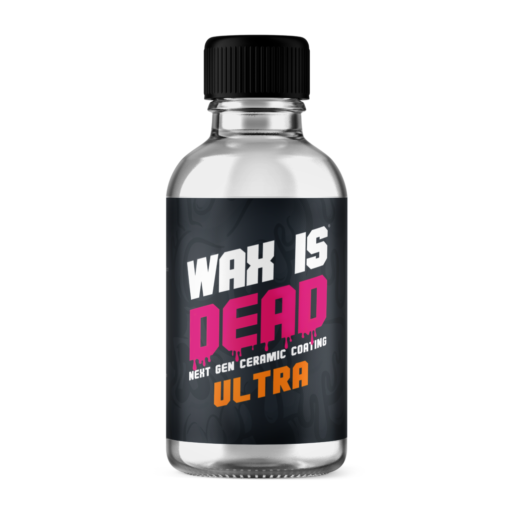 A small clear bottle of wax with a black cap and a black label. The label reads 'Wax is Dead Ultra' in bold white, pink, and orange letters, with the phrase 'Next Gen Ceramic Coating' underneath.