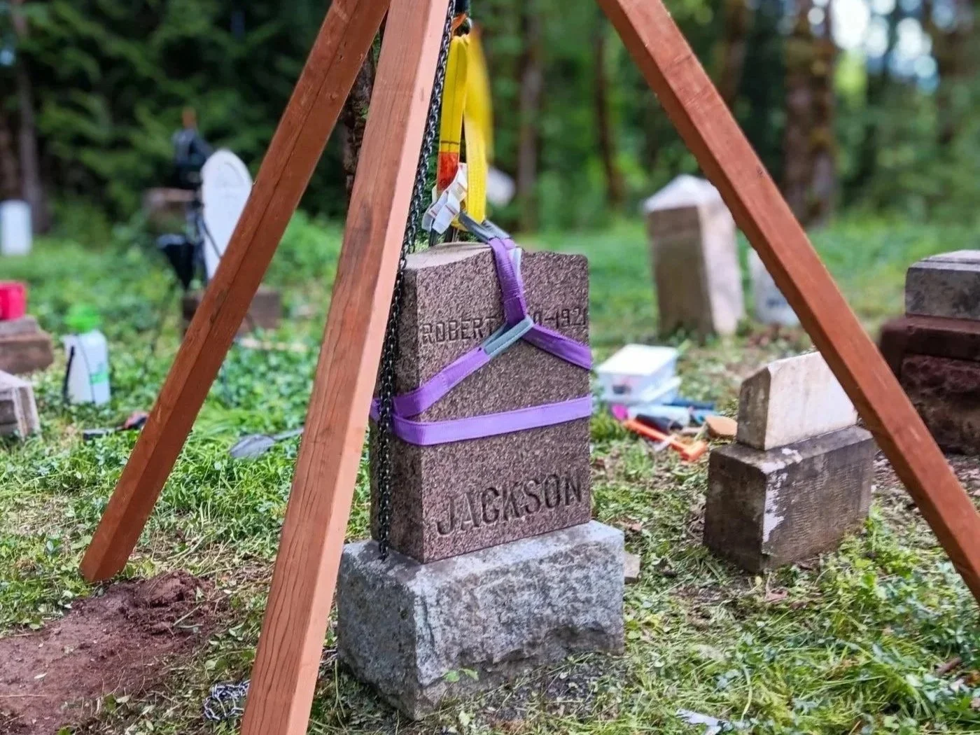 headstone being repaired historic cemetery