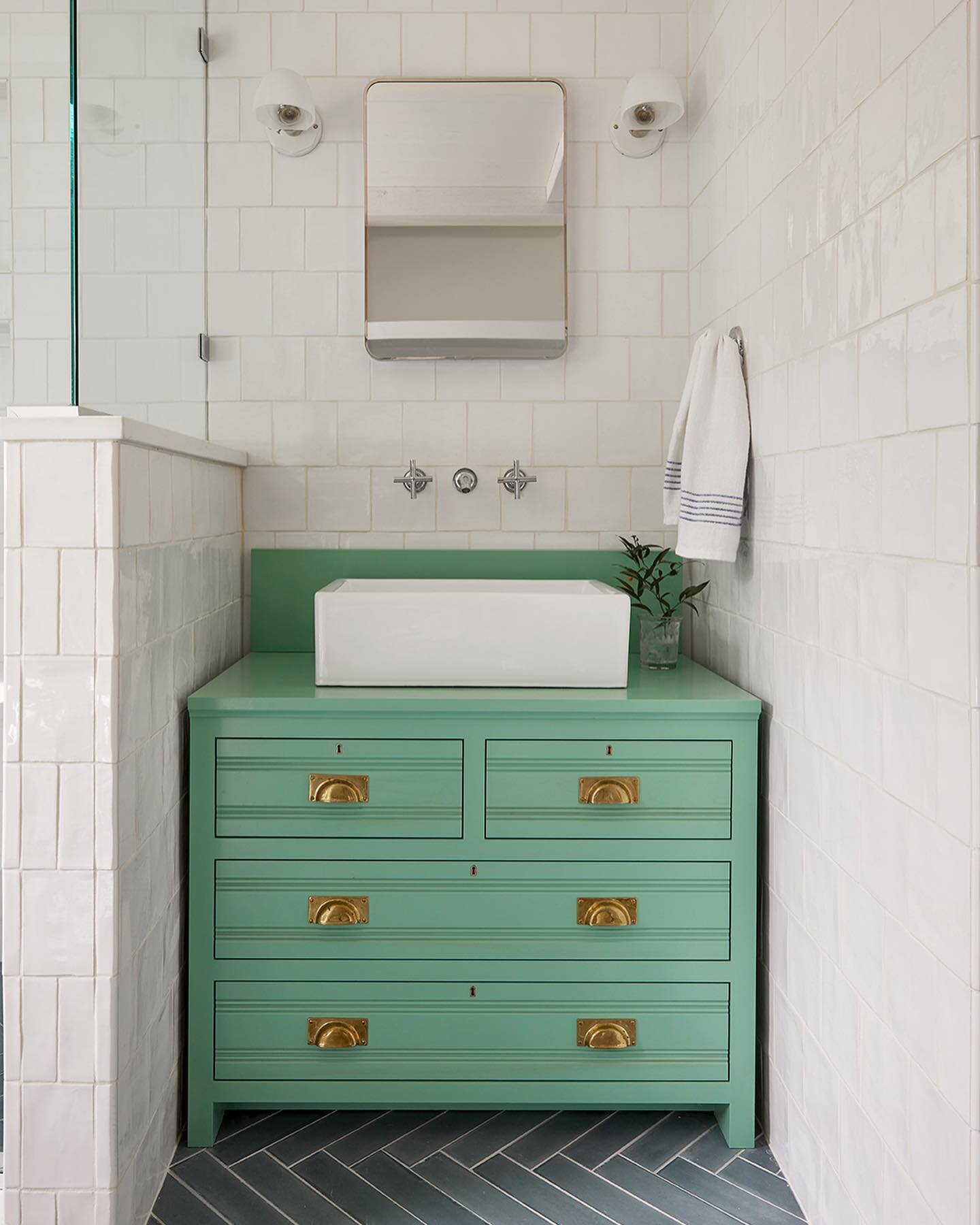 It&rsquo;s a foggy, stormy morning, but feeling a dose of spring in this color palette from a favorite bath in our Kennebunkport project. The custom vanity was inspired by an antique precedent, complete with salvaged escutcheons and painted with @far