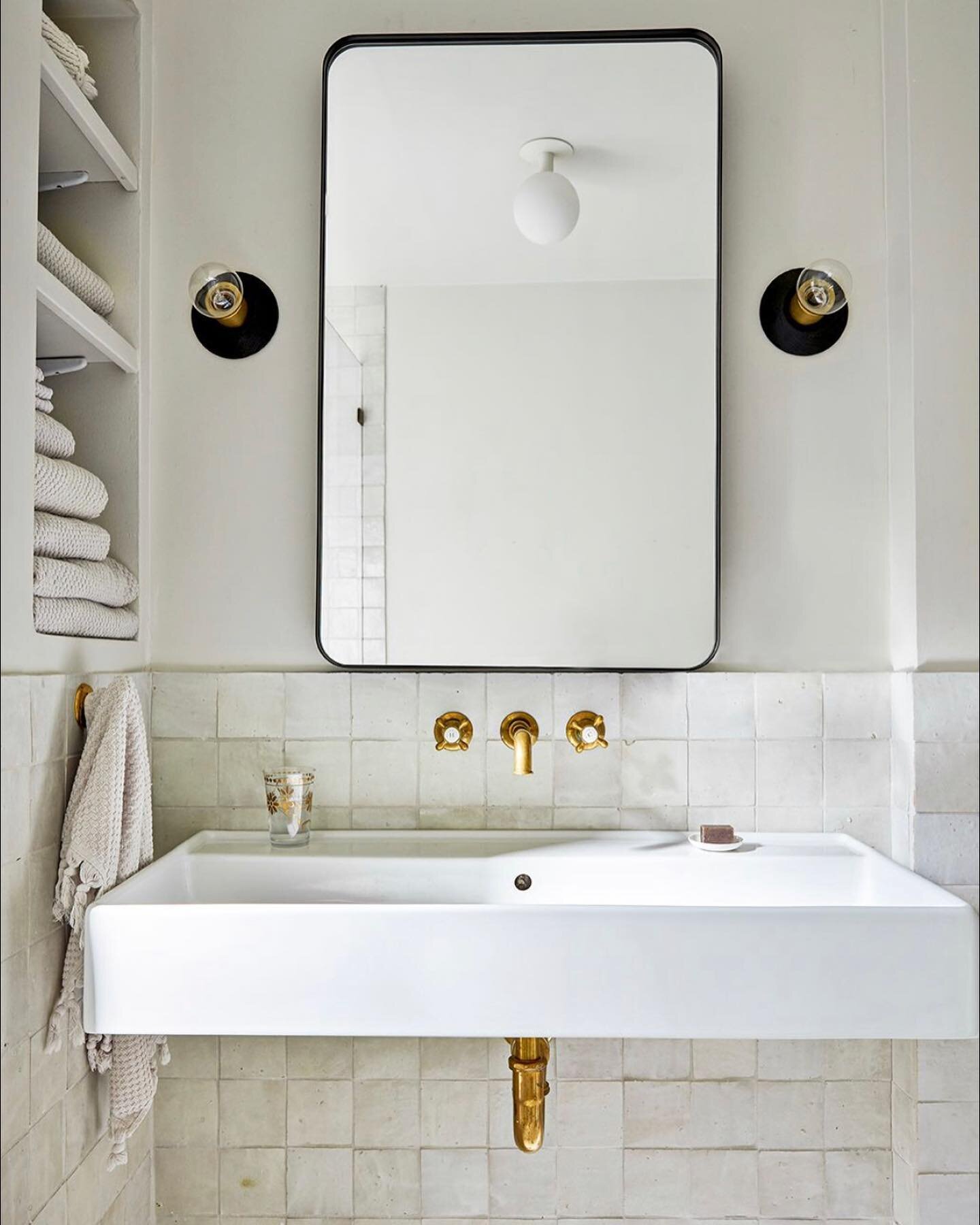 Sparkling spring light in this airy bath from our Brookline Village project, featuring a favorite material&hellip; the gorgeously tactile and oh so interesting neutral @cletile zellige tile in weathered white. The glaze on this handmade Moroccan terr