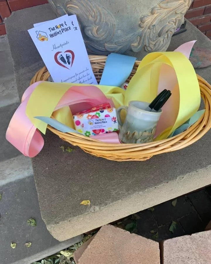 Our annual Pregnancy & Infant Death Awareness ribbons are now on the front porch for you. 
Each ribbon is a symbol of precious lives. Choose a ribbon, write the name(s) of your child(ren), share a special message or memory, and tie it on our tre