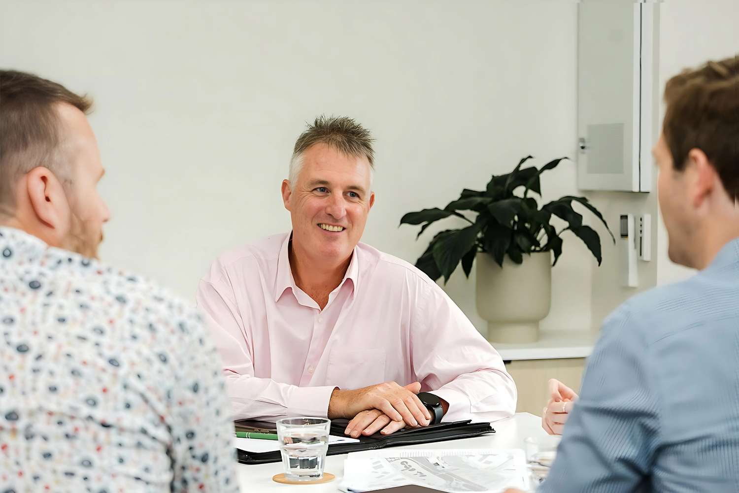 Chris Green in a working session with business owners