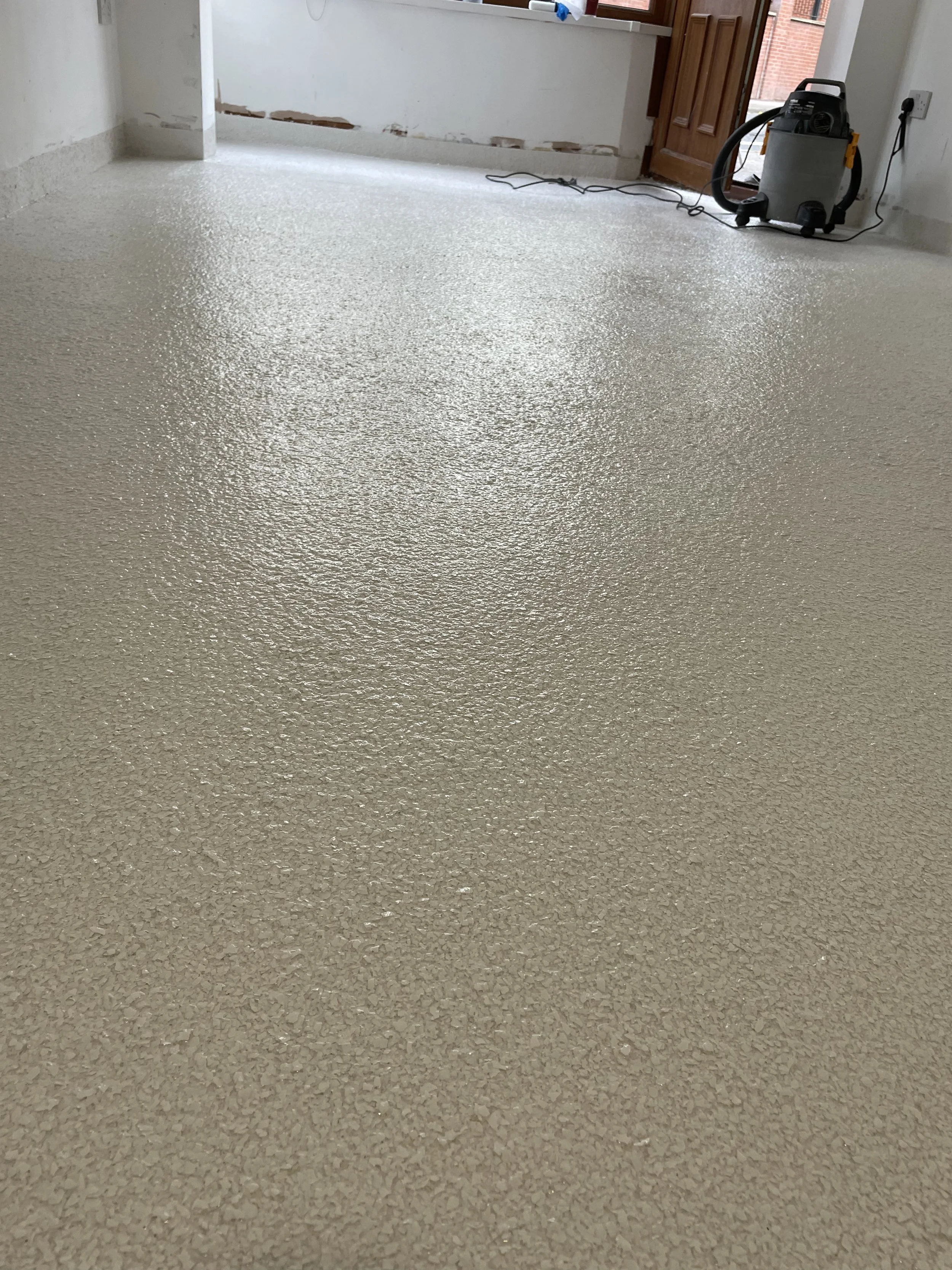 white commercial epoxy resin coating in cafe located in Leeds