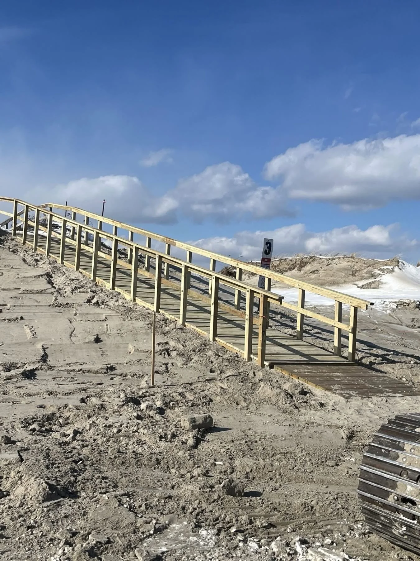 wooden ramp leading to beach