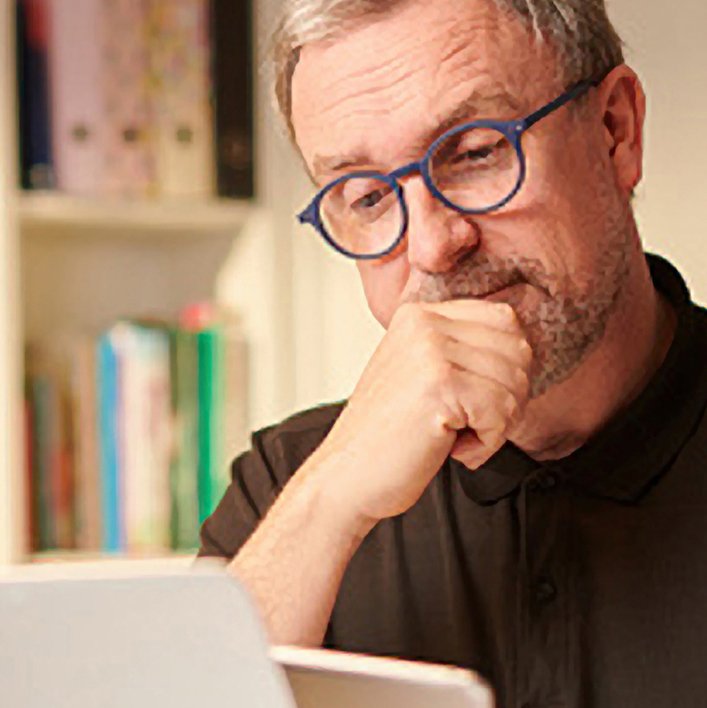 EE Man at Desk SQ