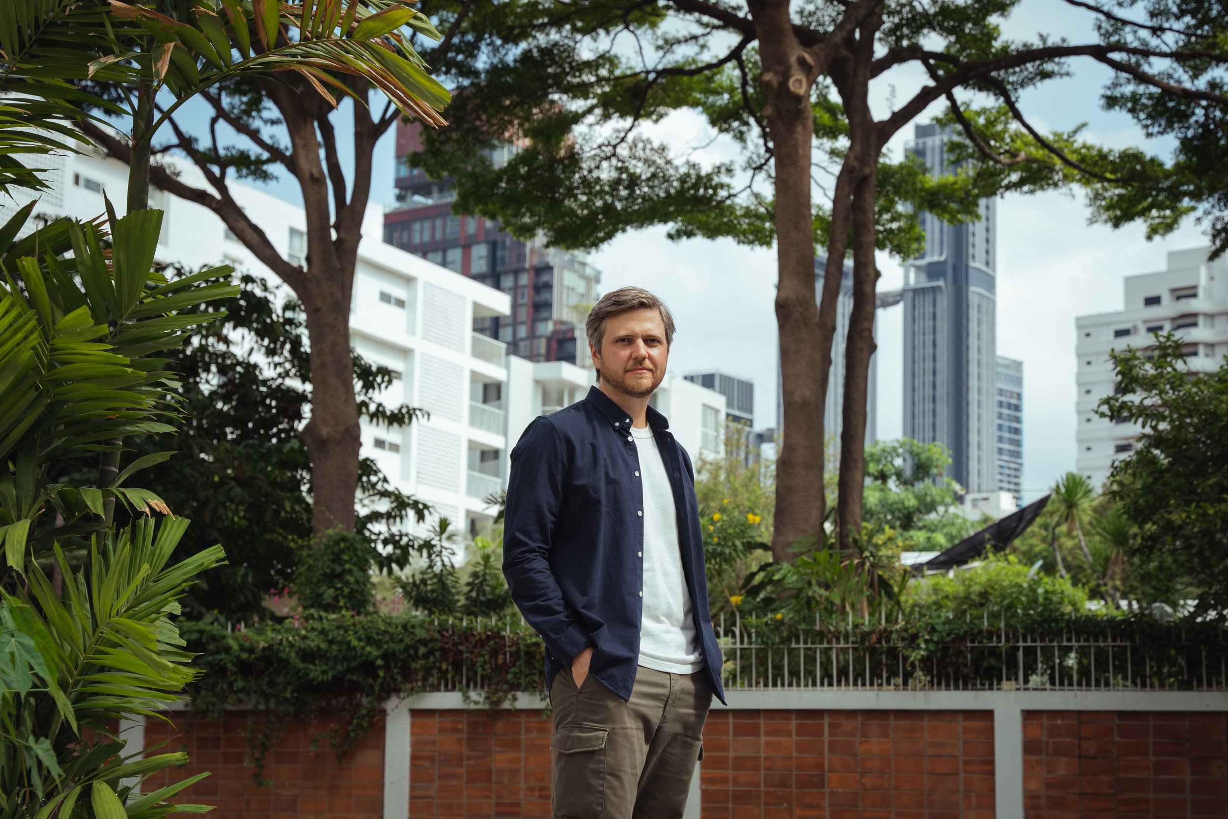 Axel Kronholm poses for a portrait. The journalist won the Nils Horner Award for his work as a Southeast Asia correspondent for Swedish Radio. Shot for Journalisti Magazine. (Bangkok, Thailand)