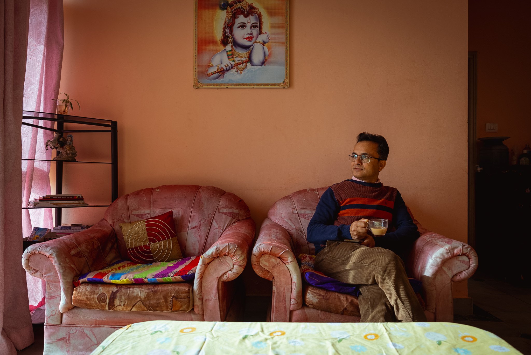 Leading fistula surgeon Dr Mohan Chandra Regmi poses for a portrait in his home, shot for UNFPA (Kathmandu, Nepal)