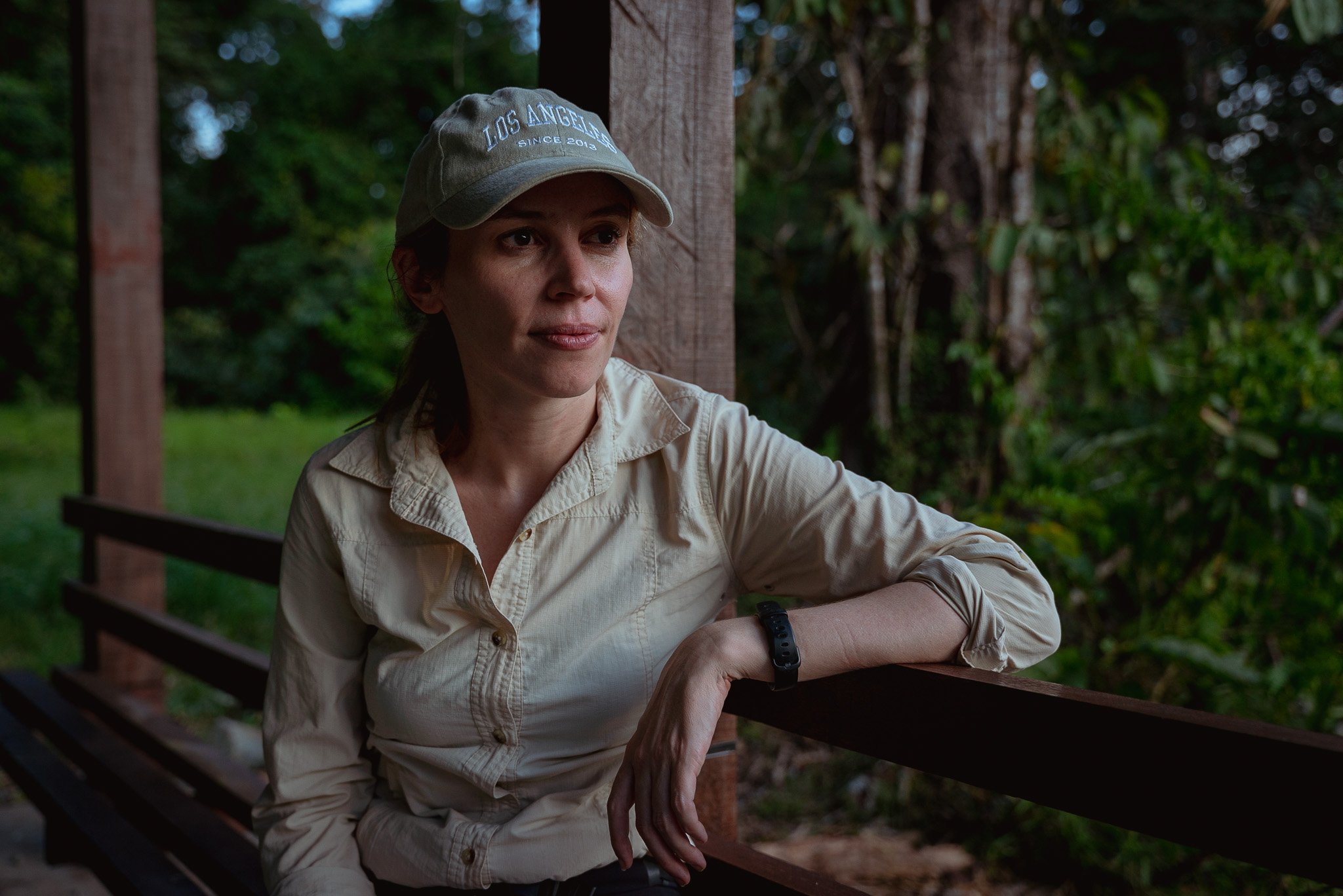 Associate Professor Kimberly Fornace who leads a monkey malaria research project poses for a portrait at dusk at the jetty house of the Danau Girange Research Centre, shot for The Telegraph (Sabah, Malaysian Borneo)
