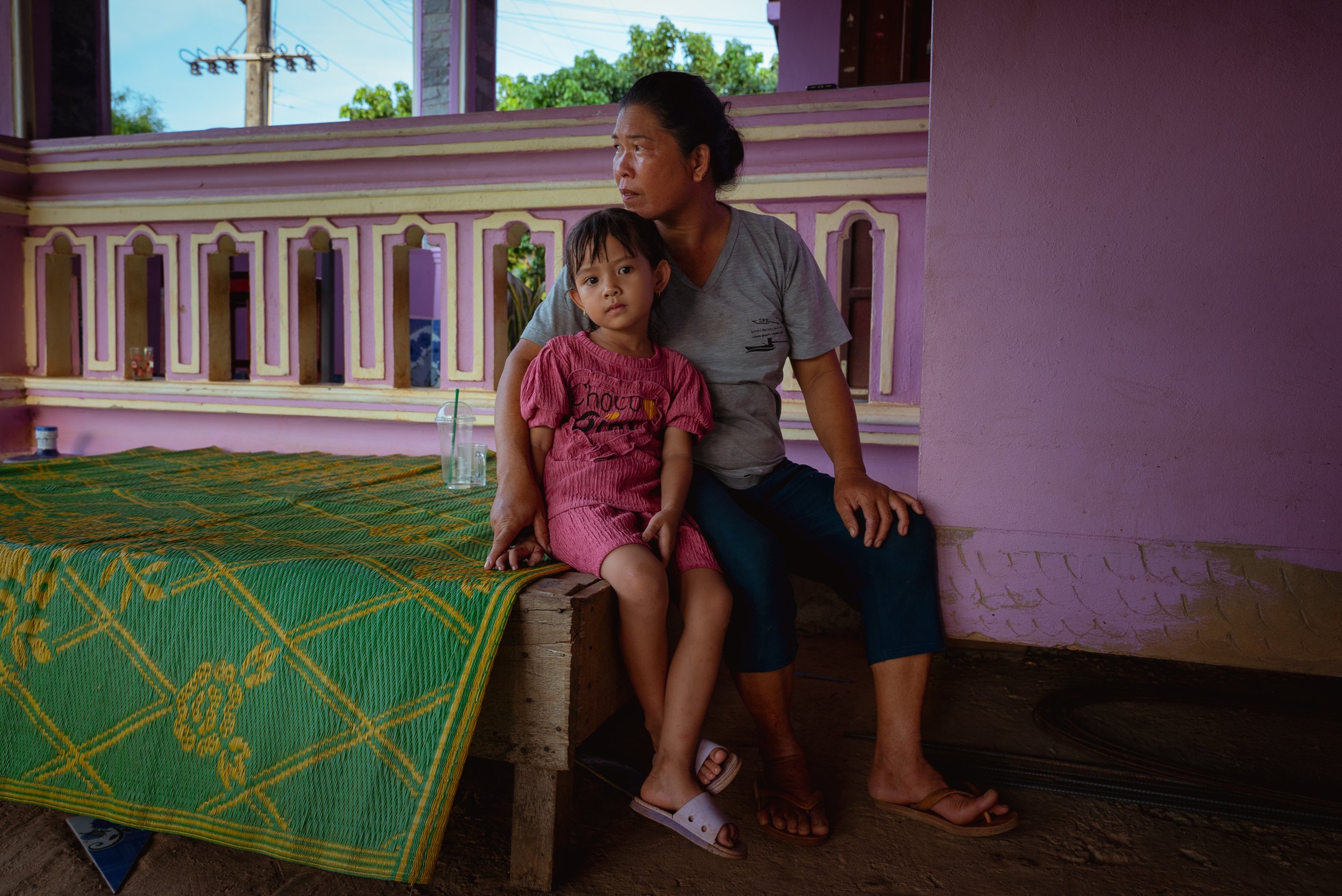 Bua and her neice Namfon, part of a community affected by unexploded ordnance, shot for UNDP (Kasi, Laos)