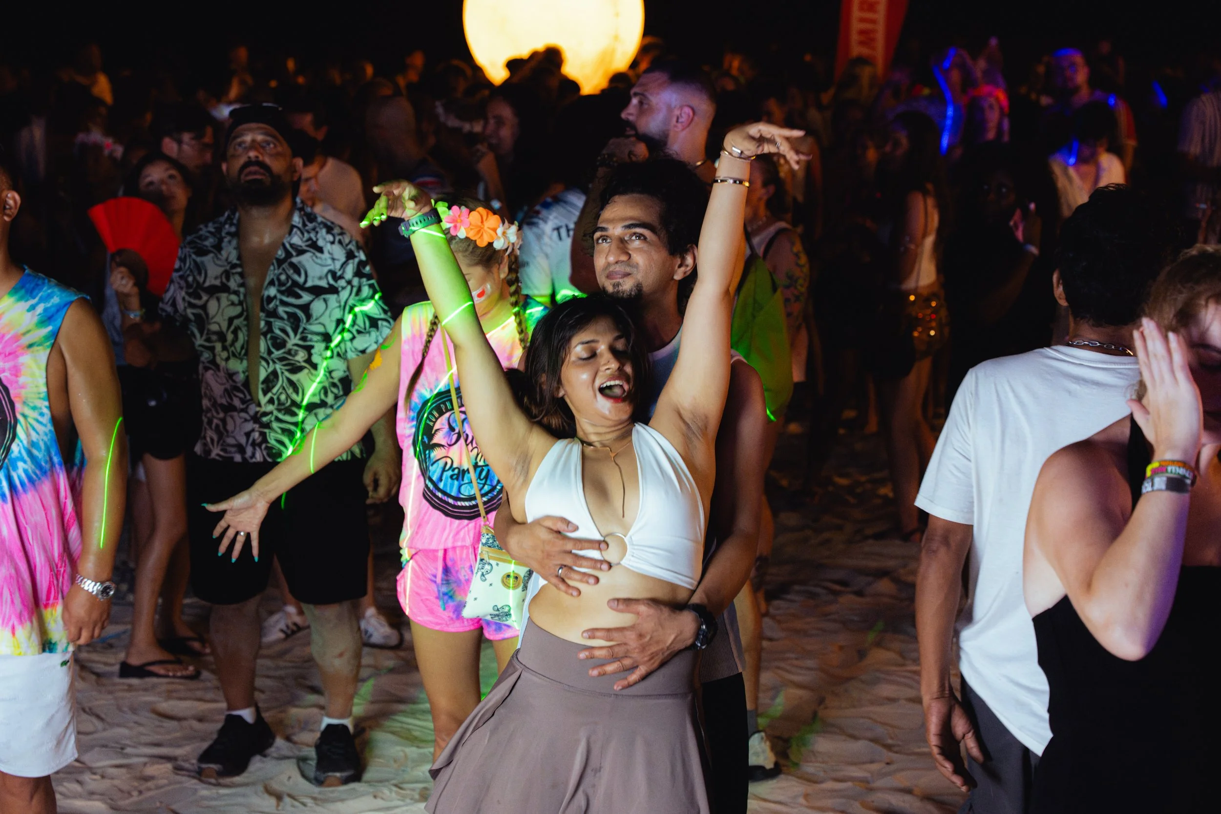 A couple dances on Haan Rin beach.