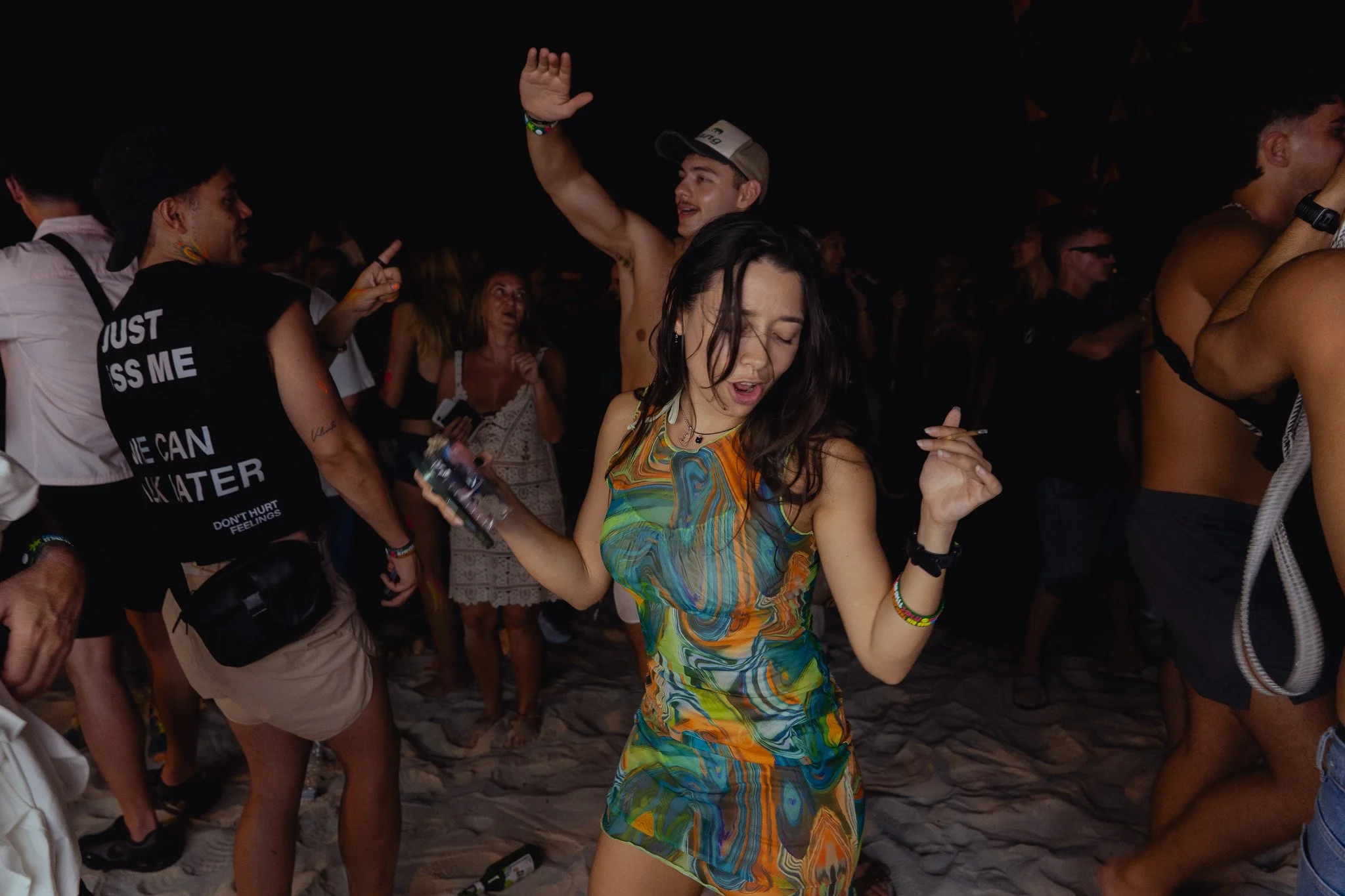 Revellers dance on Haan Rin beach.