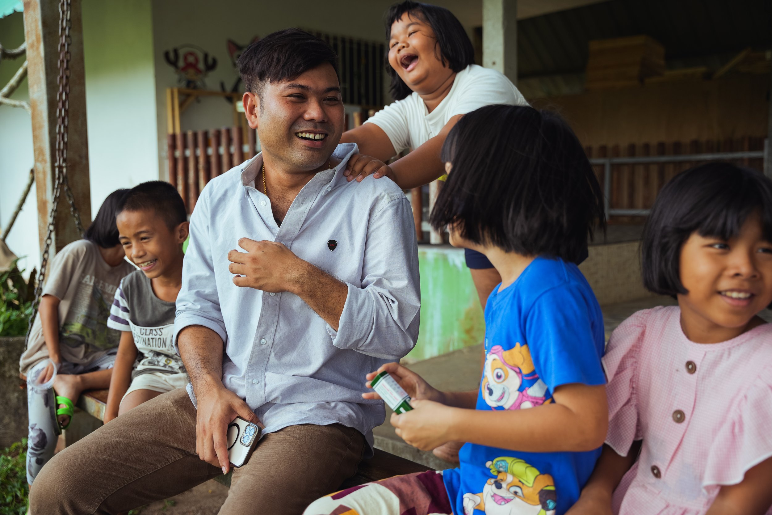 Watana “Game” Sittirachot and children at the orphanage he runs. Shot for The Telegraph (Phuket, Thailand)