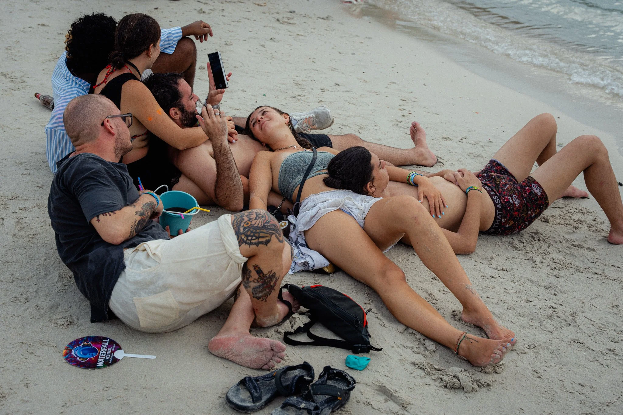 A cuddle puddle on the beach at dawn.
