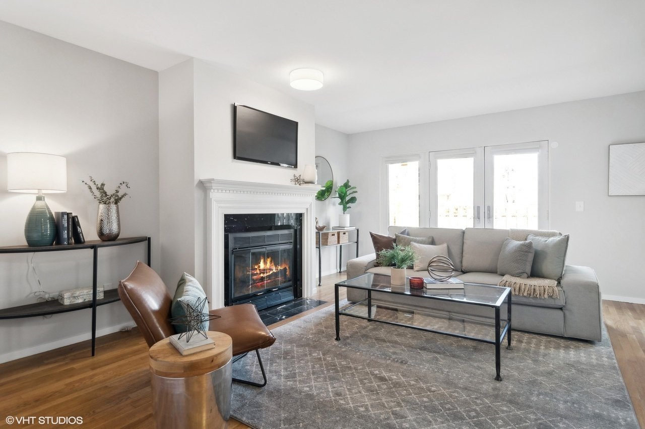 Bright &amp; airy vibes throughout this expansive end unit townhome.

Step into the light-filled living and dining room, and then head downstairs where we staged the large, multifunctional lower family room with entertaining in mind. 

Upstairs, the 