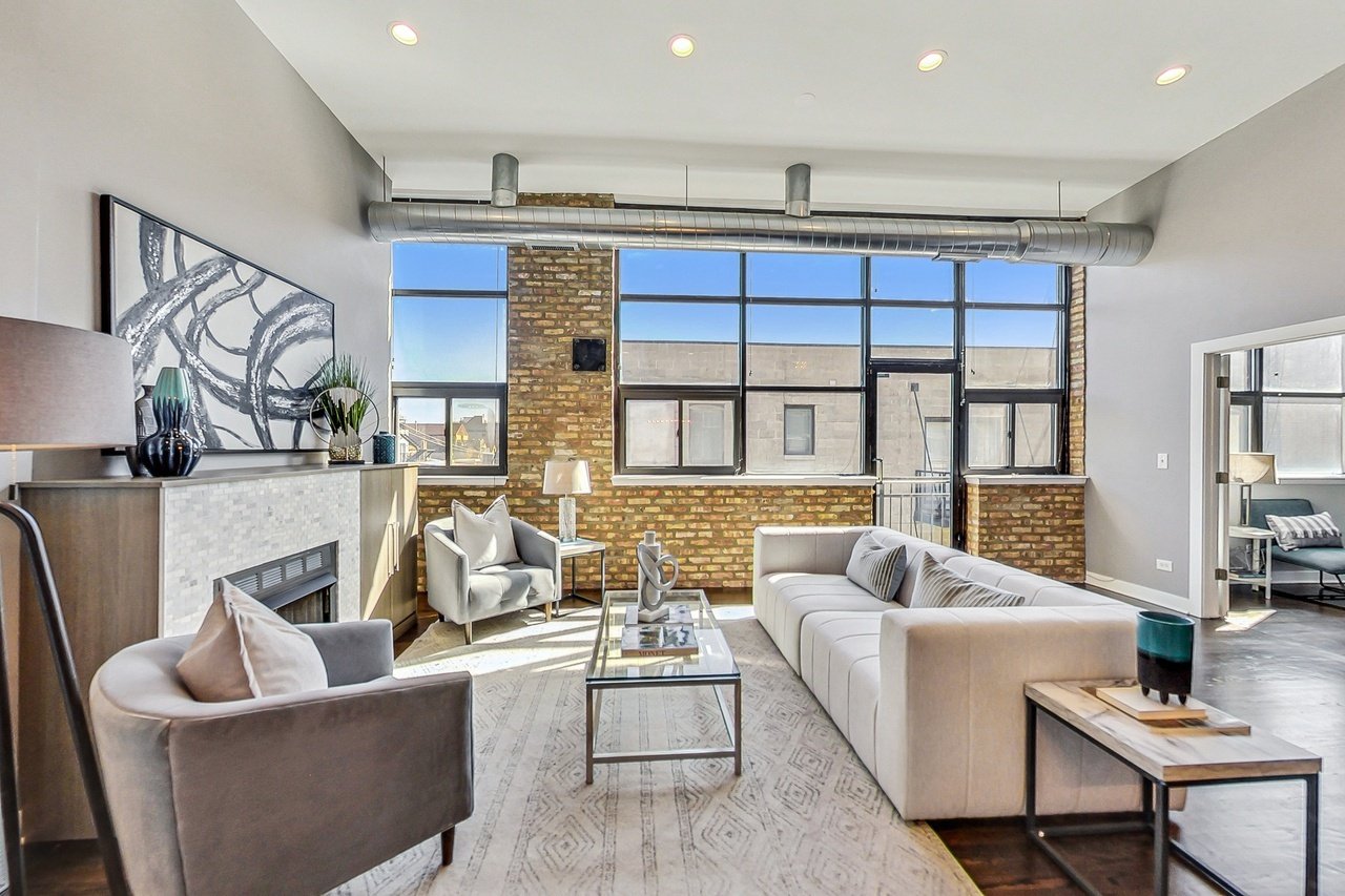From staged to under contract after 9 days on the market. 

With beautiful finishes and features, this light and spacious Wicker Park penthouse needed contemporary furnishings and a few finishing touches in the living room and home office, to appeal 