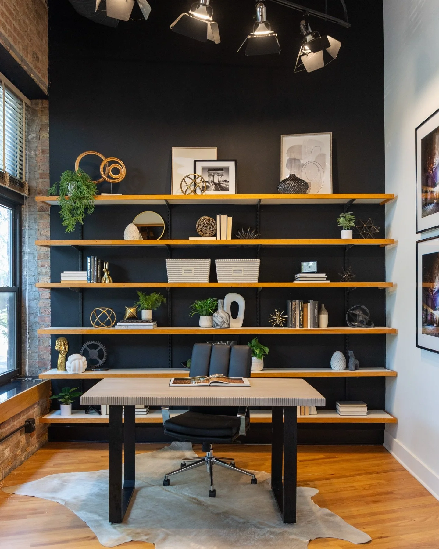 Moody tones are everywhere right now, and when used with intention, they can work beautifully in a staged home.

We still lead with bright, neutral foundations so potential buyers can feel the light, space, and possibility. But a strategic hit of a m