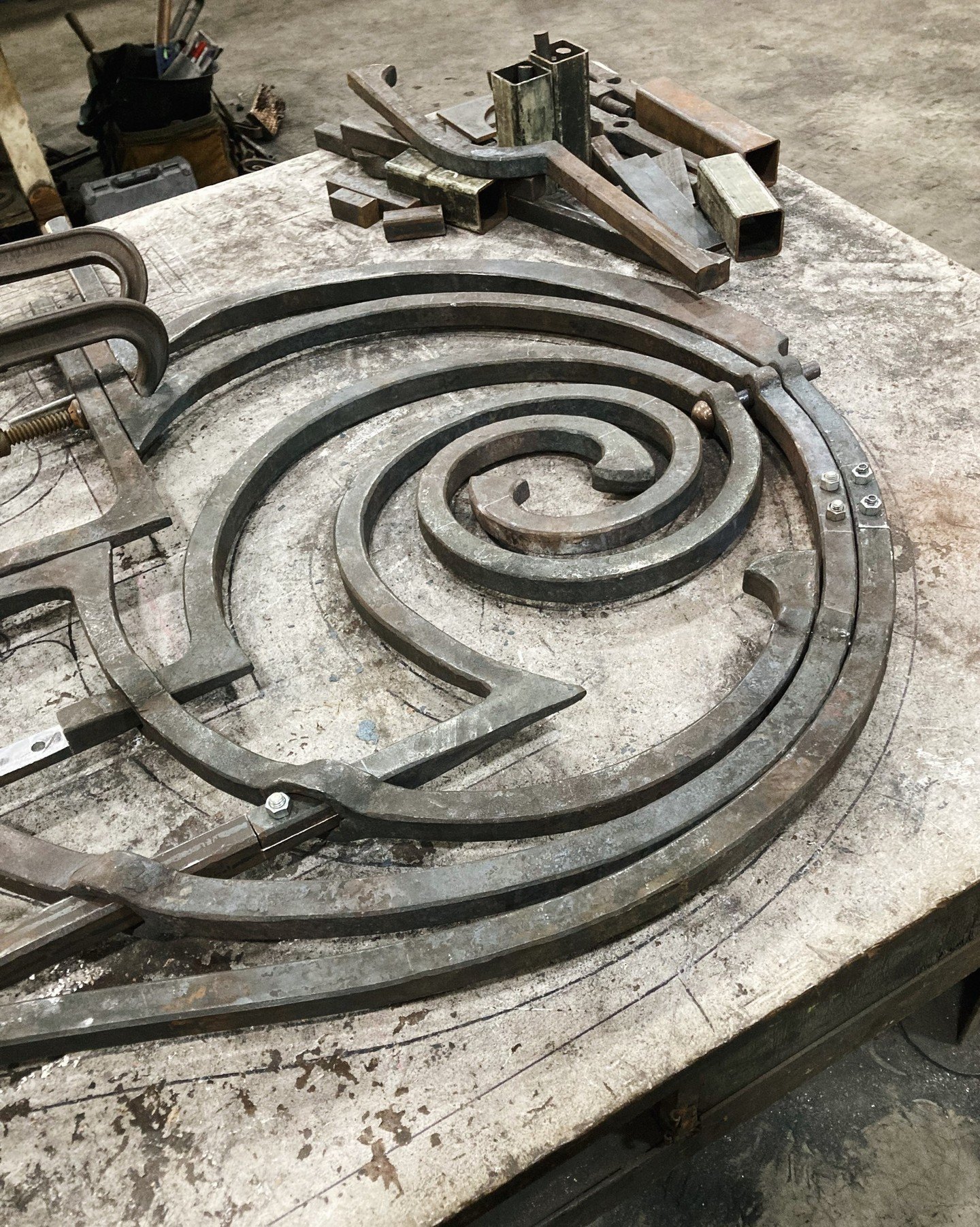 Capstone progress report from blacksmithing senior @paulreilly_ironcraft whose work on the Omniscience sculpture at the Gibbes Museum was featured here earlier this year. Paul is crafting a hand forged 3' x 7' door with a Roman arch inspired by Botta