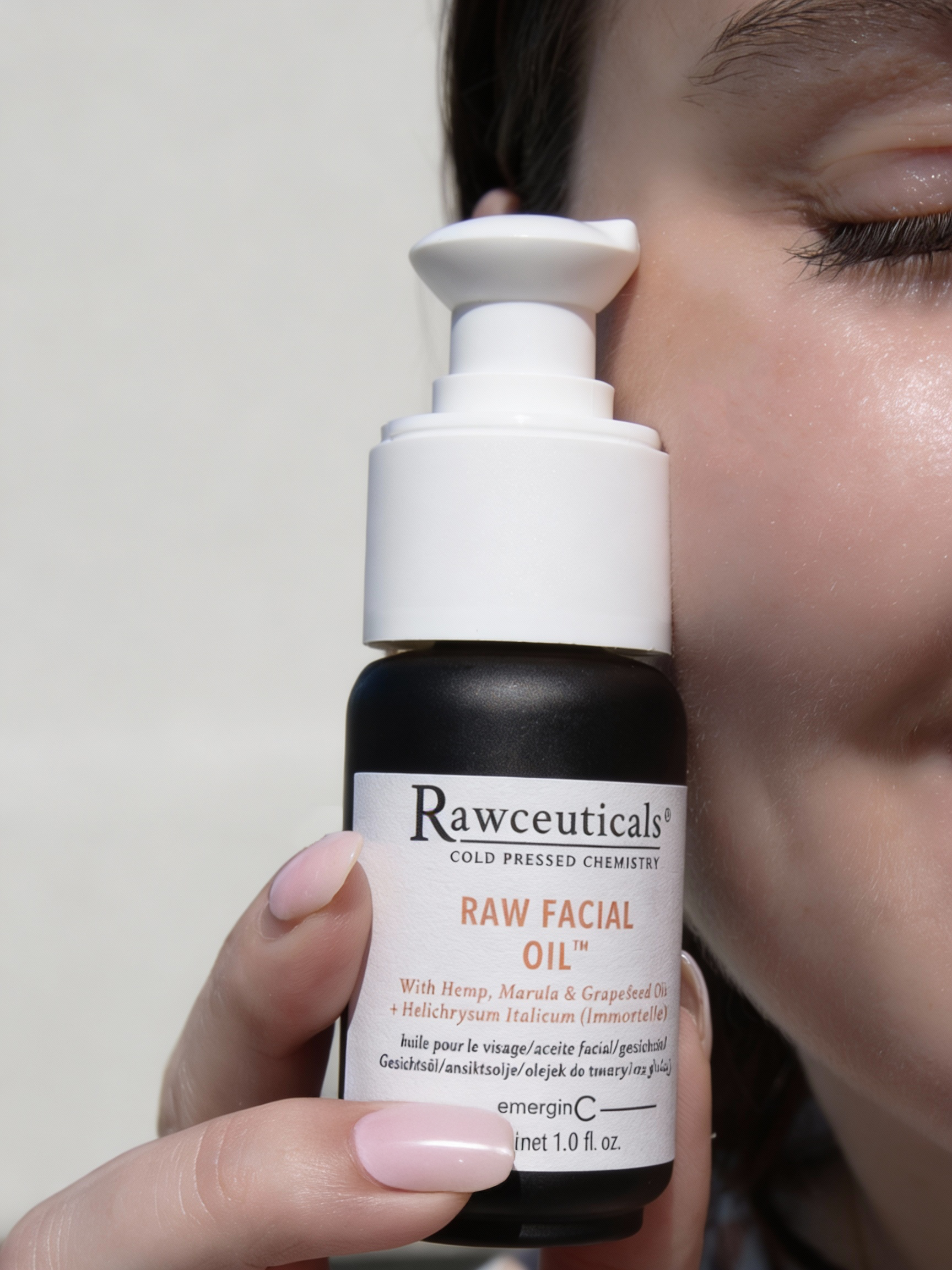 raw facial oil + model.png