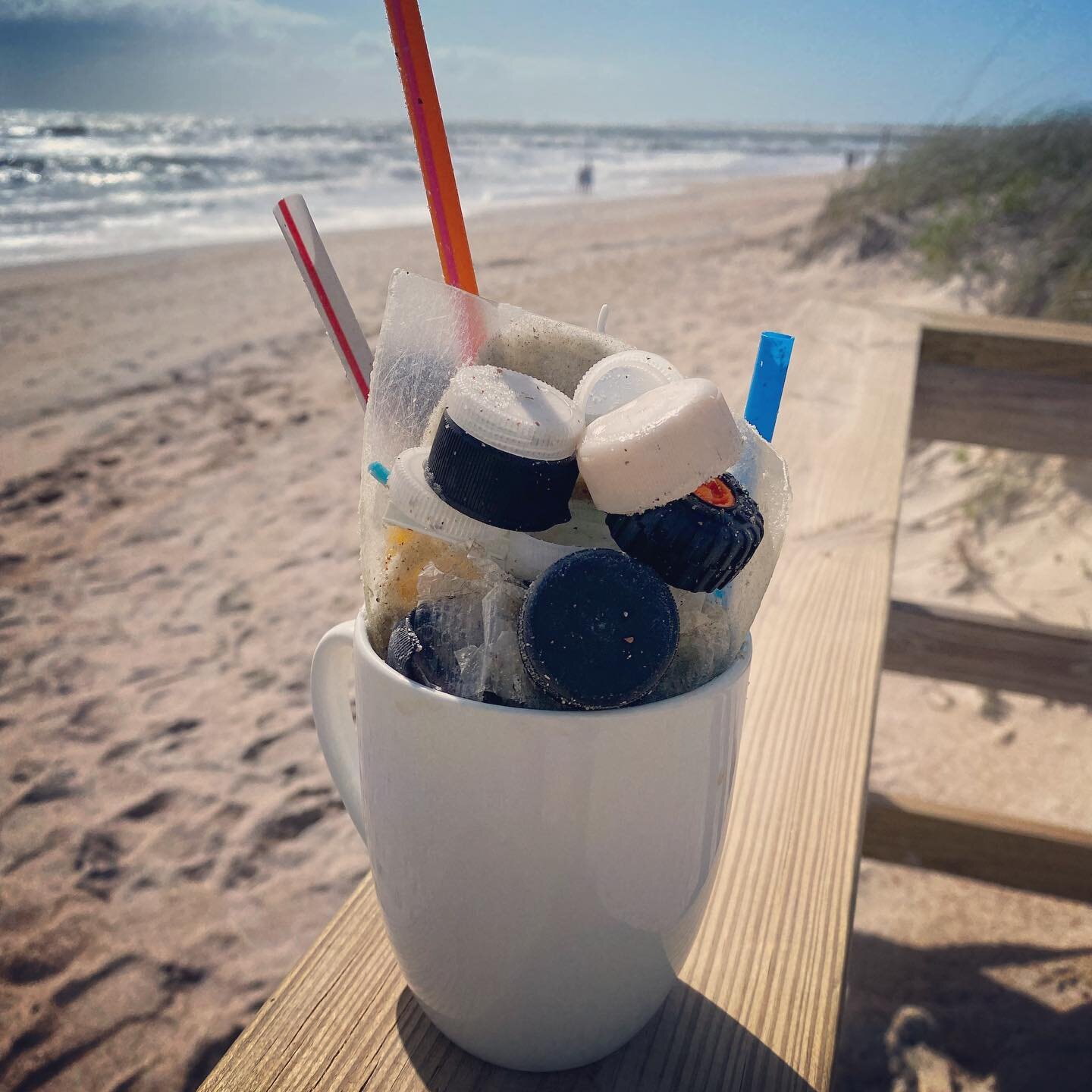 This mug was full of coffee on the start of our morning walk. Upon return we had collected at least three straws (did you know straws are lethal for sea turtles?!) and countless pieces of plastic including a dozen bottle caps. Change can start small,
