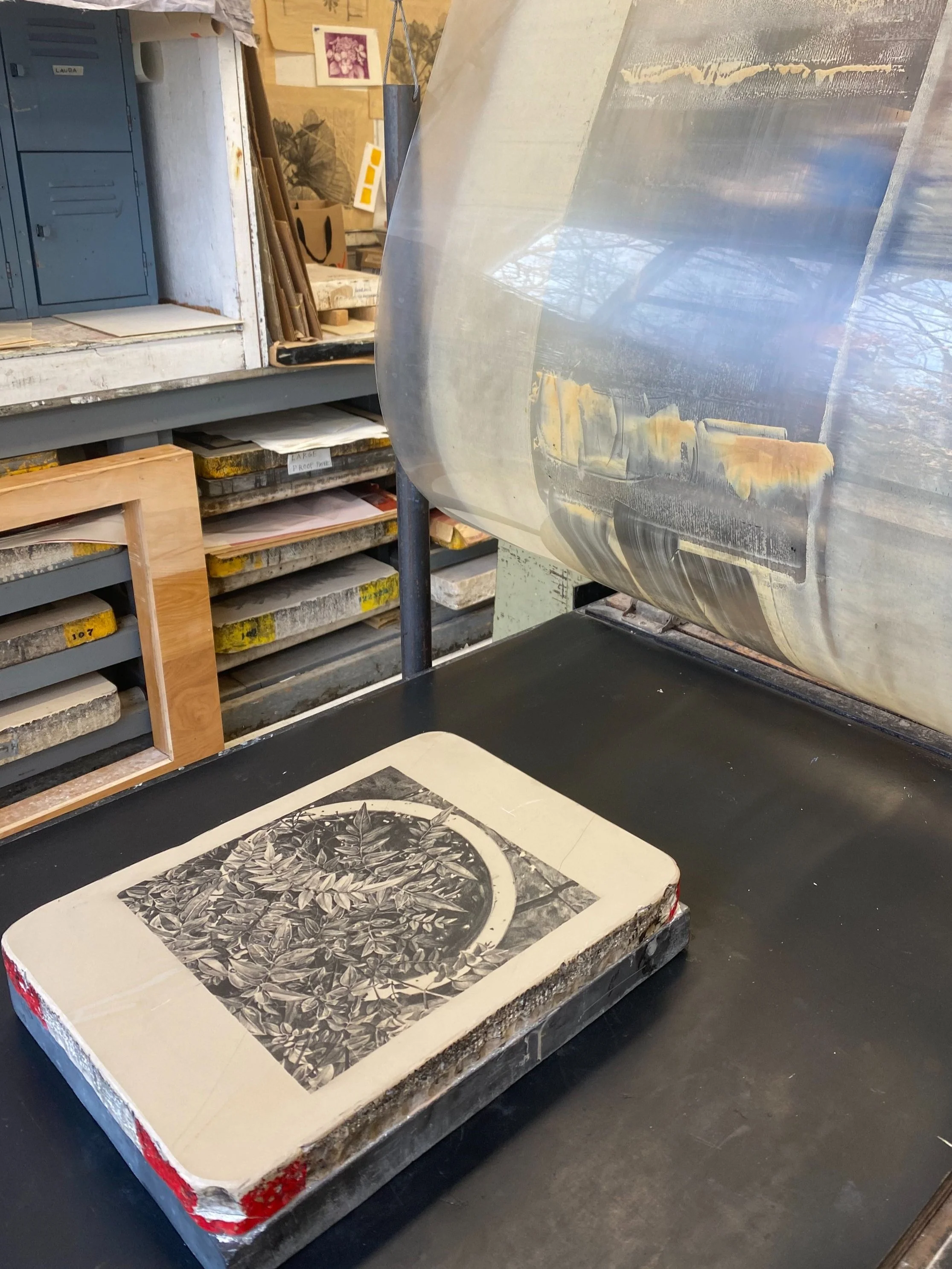 The finished stone on the press for printing
