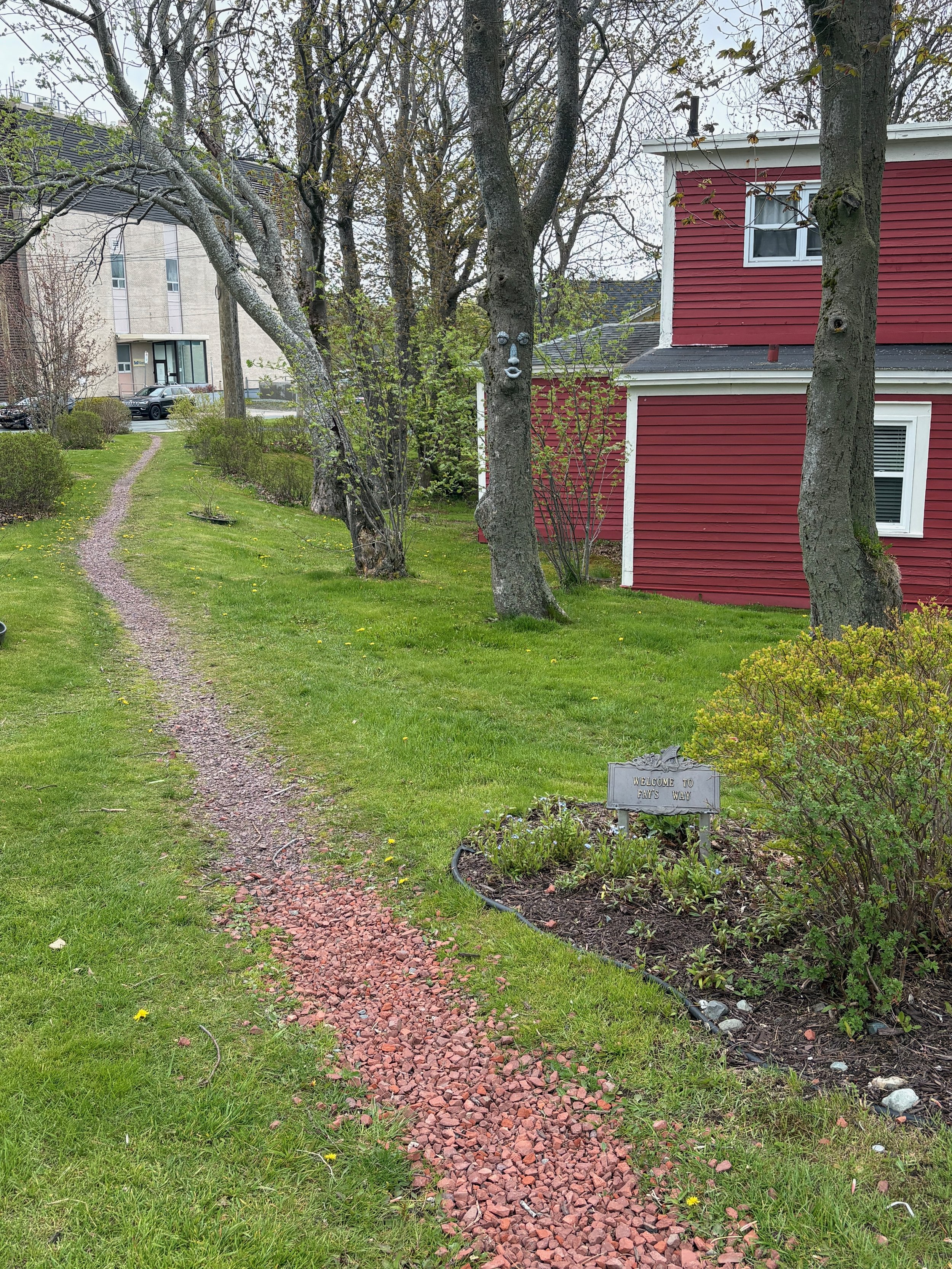 June 8 -Fays Way -
I wonder who Fay was along the way. -
Is it a sweet little memorial way or someone doing a kind thing? -
I walked past this spot a couple of times while I was staying on campus. - 
As I walked along the way, this little sign struck