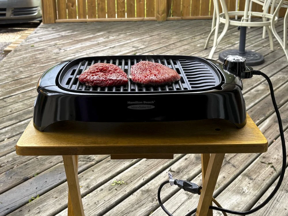 June 4 - The Grill - Early in May, I decided we needed to change up some of our extremely boring eating habits.  To add a little spice to our lives.  I miss a good BBQ.  Now this isn't a BBQ but it sure does make a big difference.  Steaks and Hot Dog