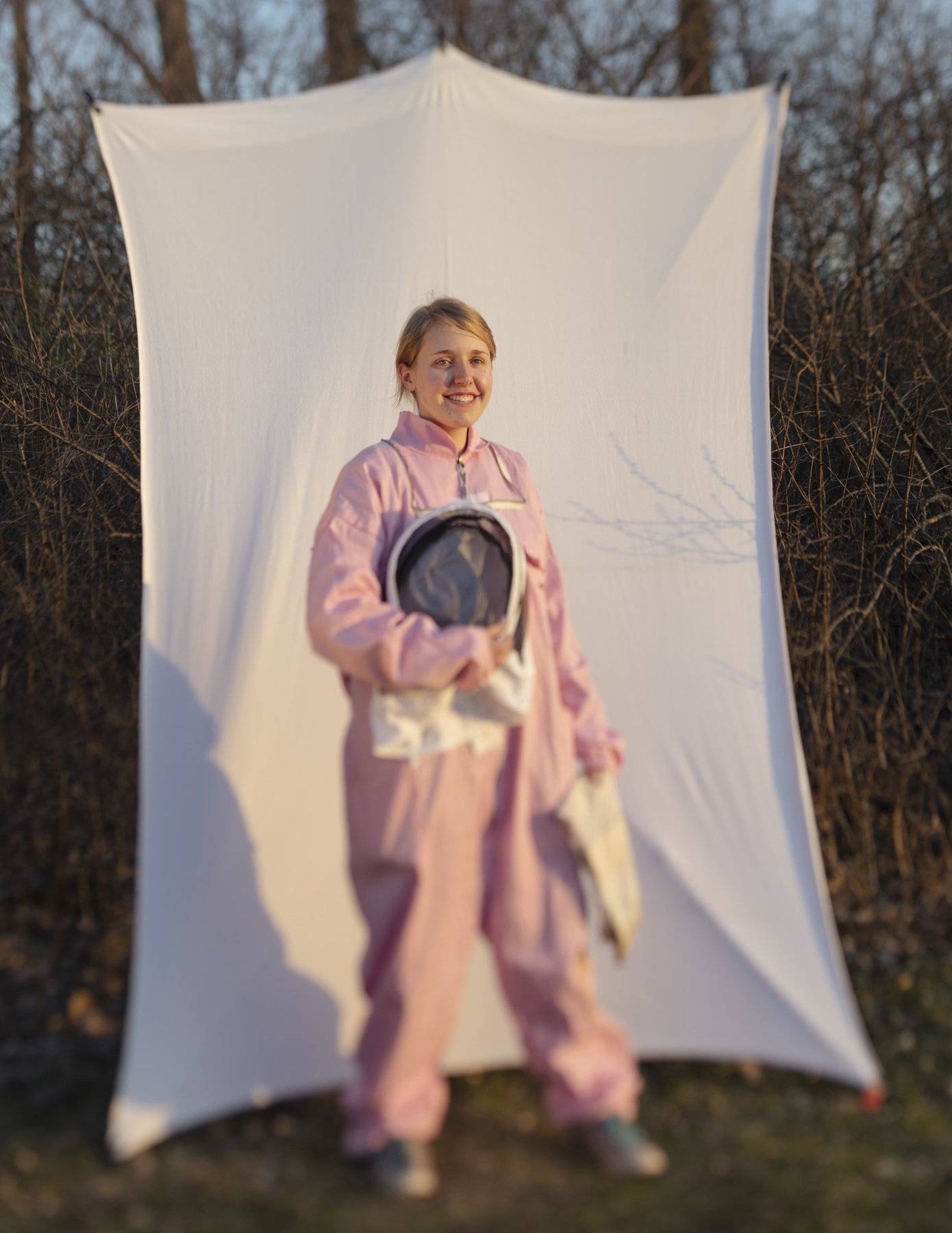  RIT beekeeping club president, Emma Eagen, poses for a portrait nearby the hives at Rochester Institute of Technology in Rochester N.Y. on April 4, 2021. Eagen is a third-year international and global studies major on the pre-med track. The image wa